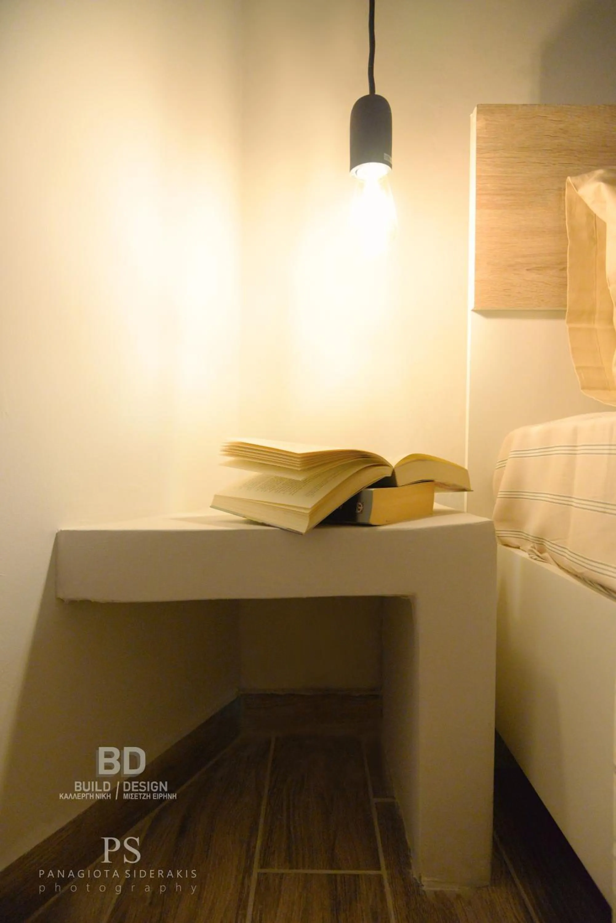 Bed in Pyrgos Houses and Restaurant