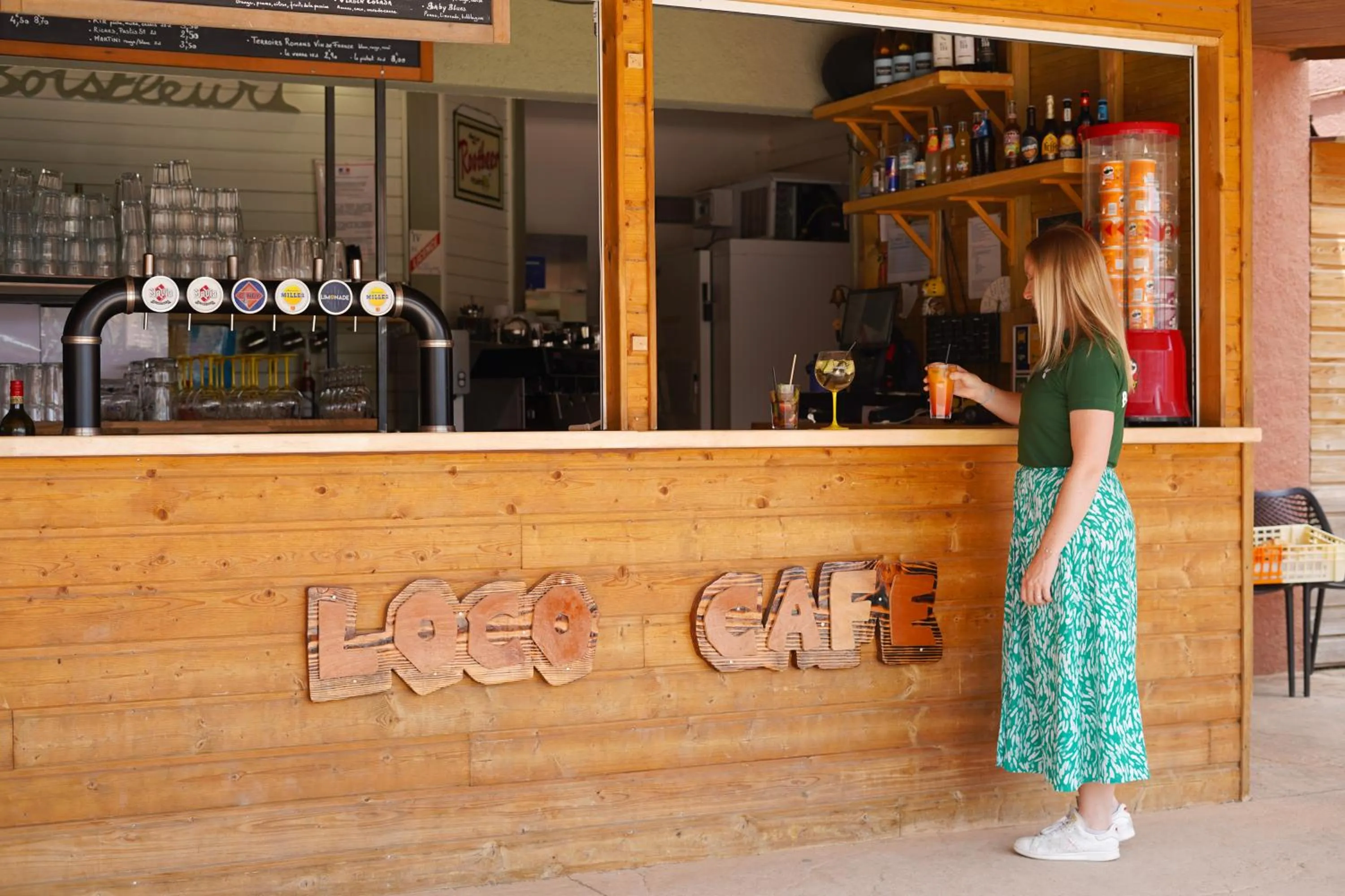 Lounge or bar in Camping Le Bois Fleuri