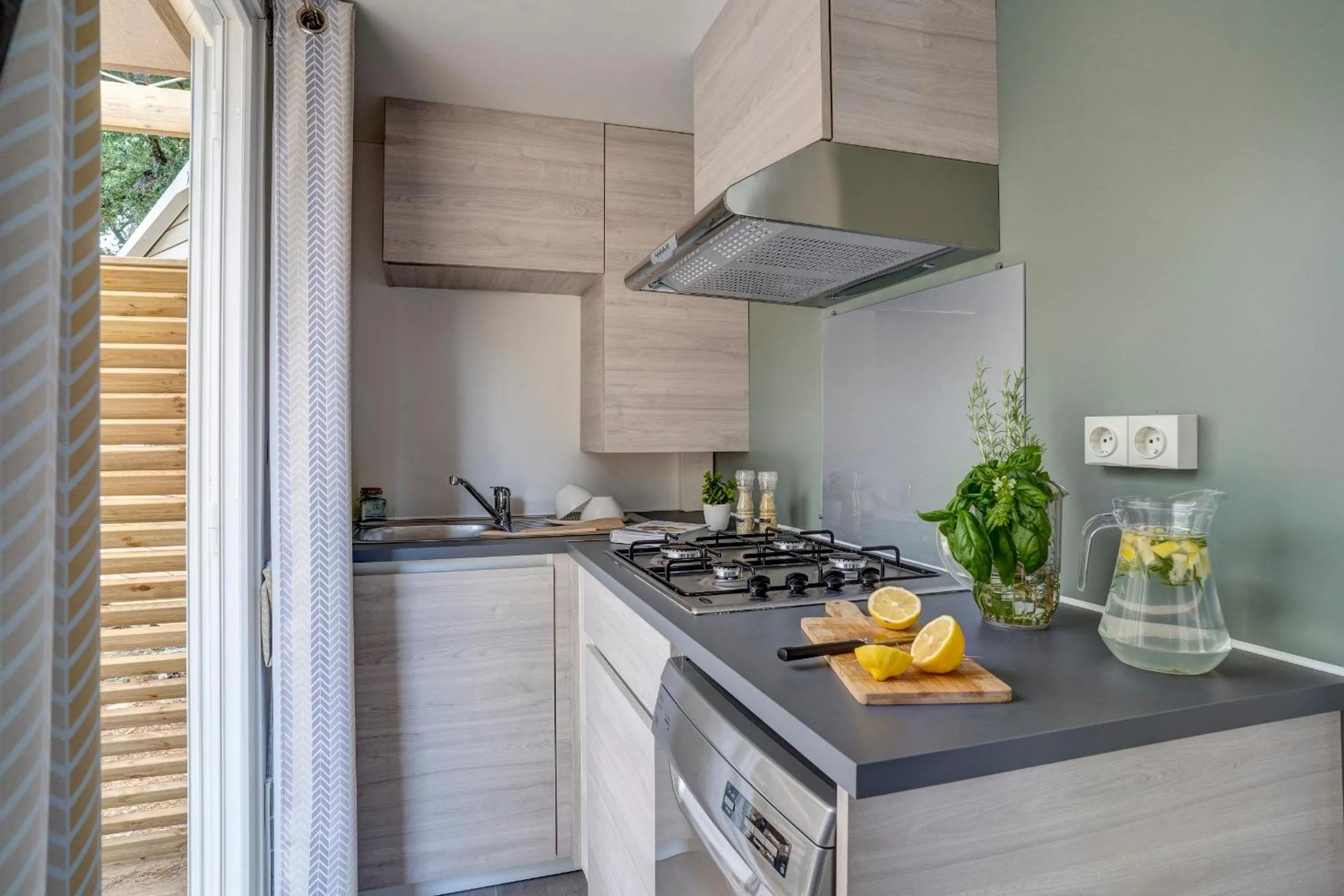 Kitchen or kitchenette in Camping Le Bois Fleuri