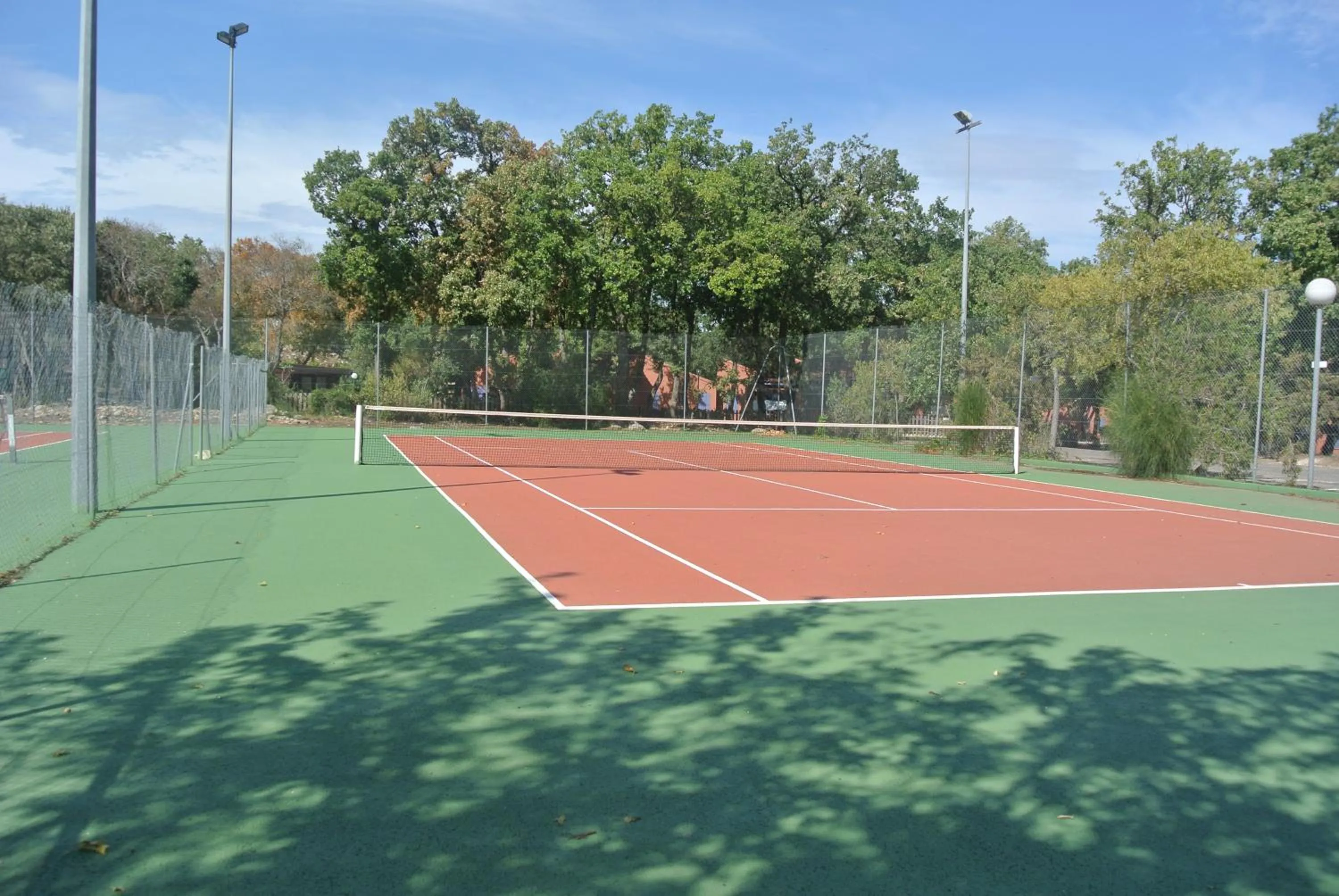 Tennis court in Camping Le Bois Fleuri