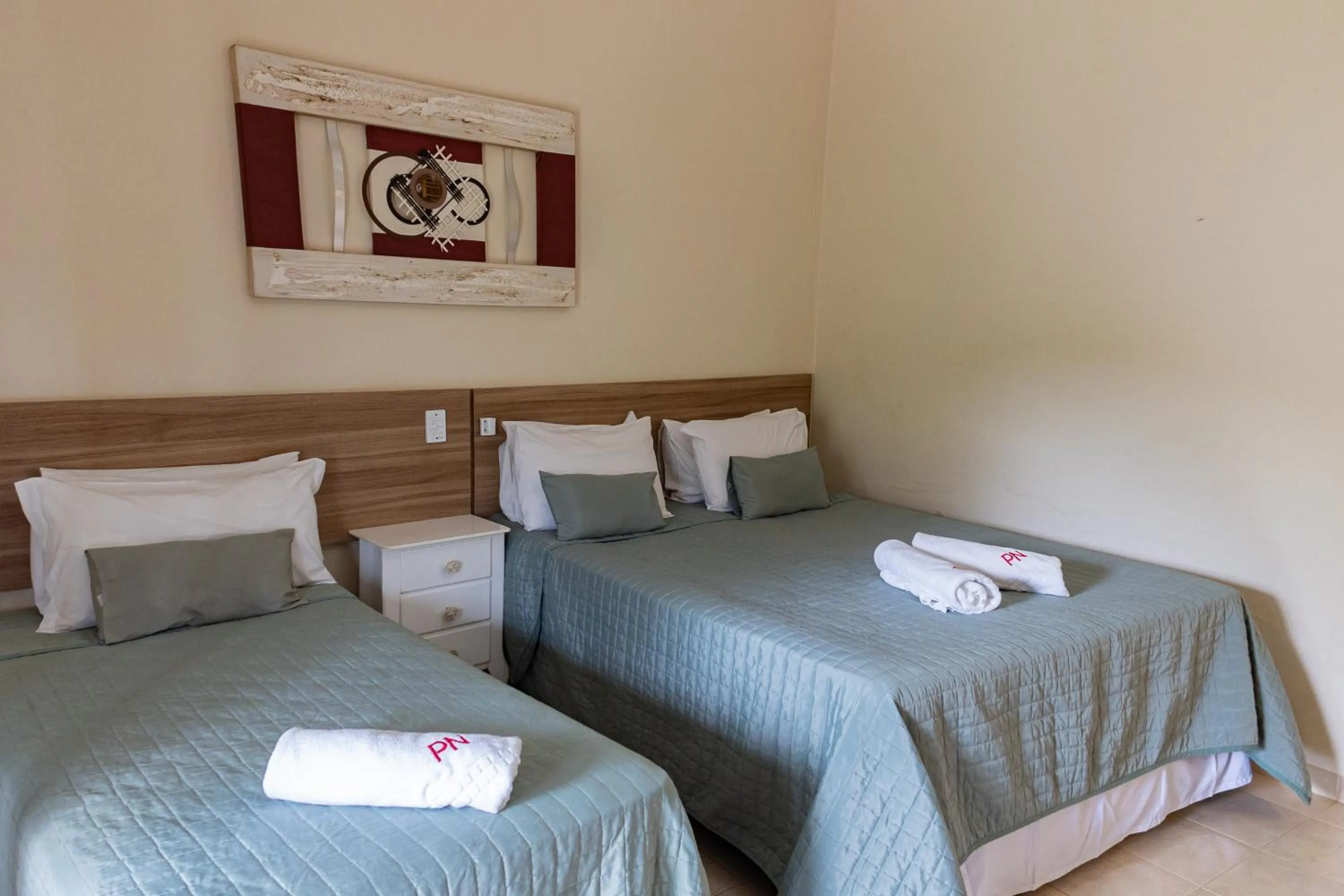 Bed in Pousada Nefelibatas