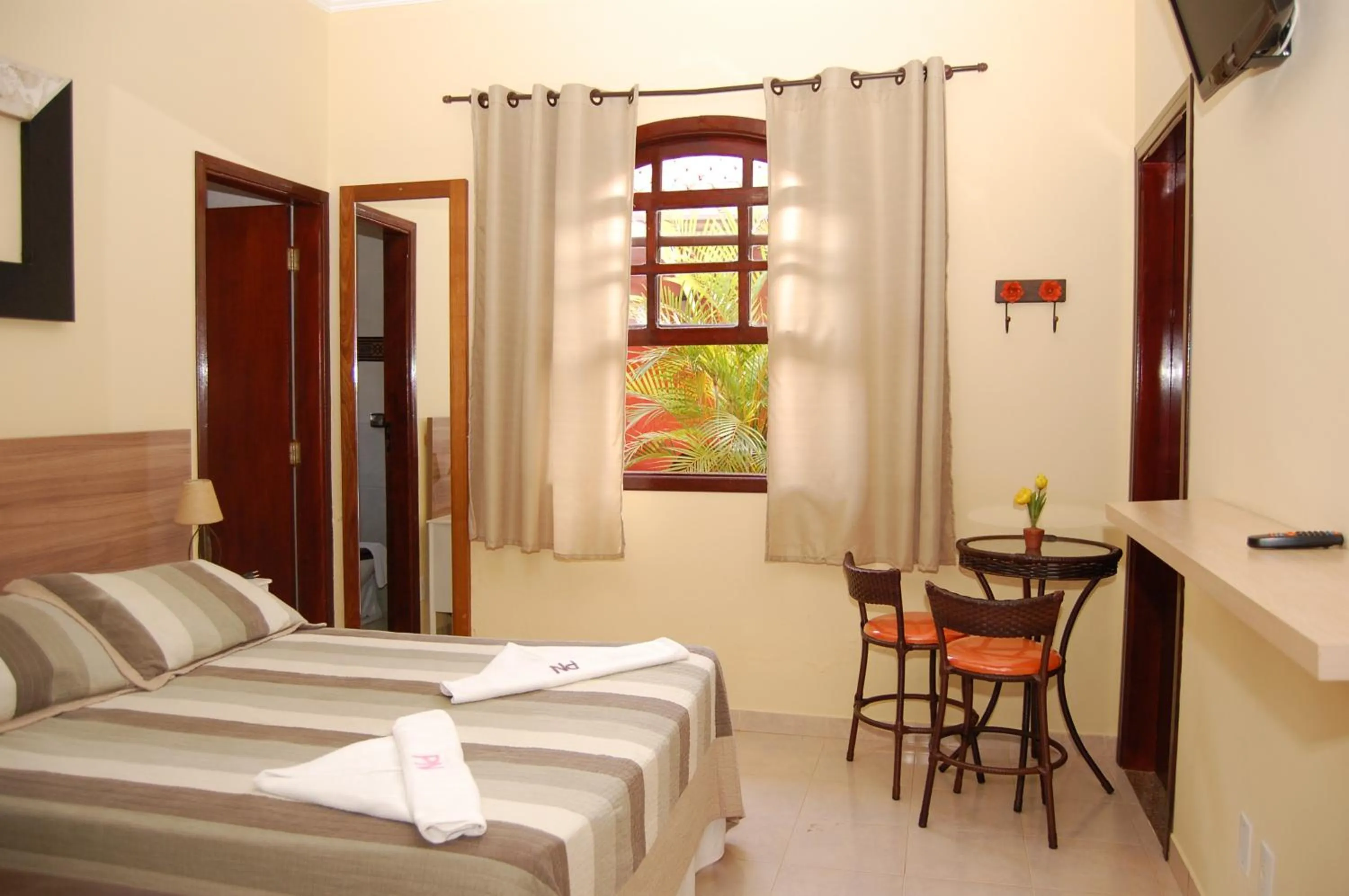 Bed in Pousada Nefelibatas