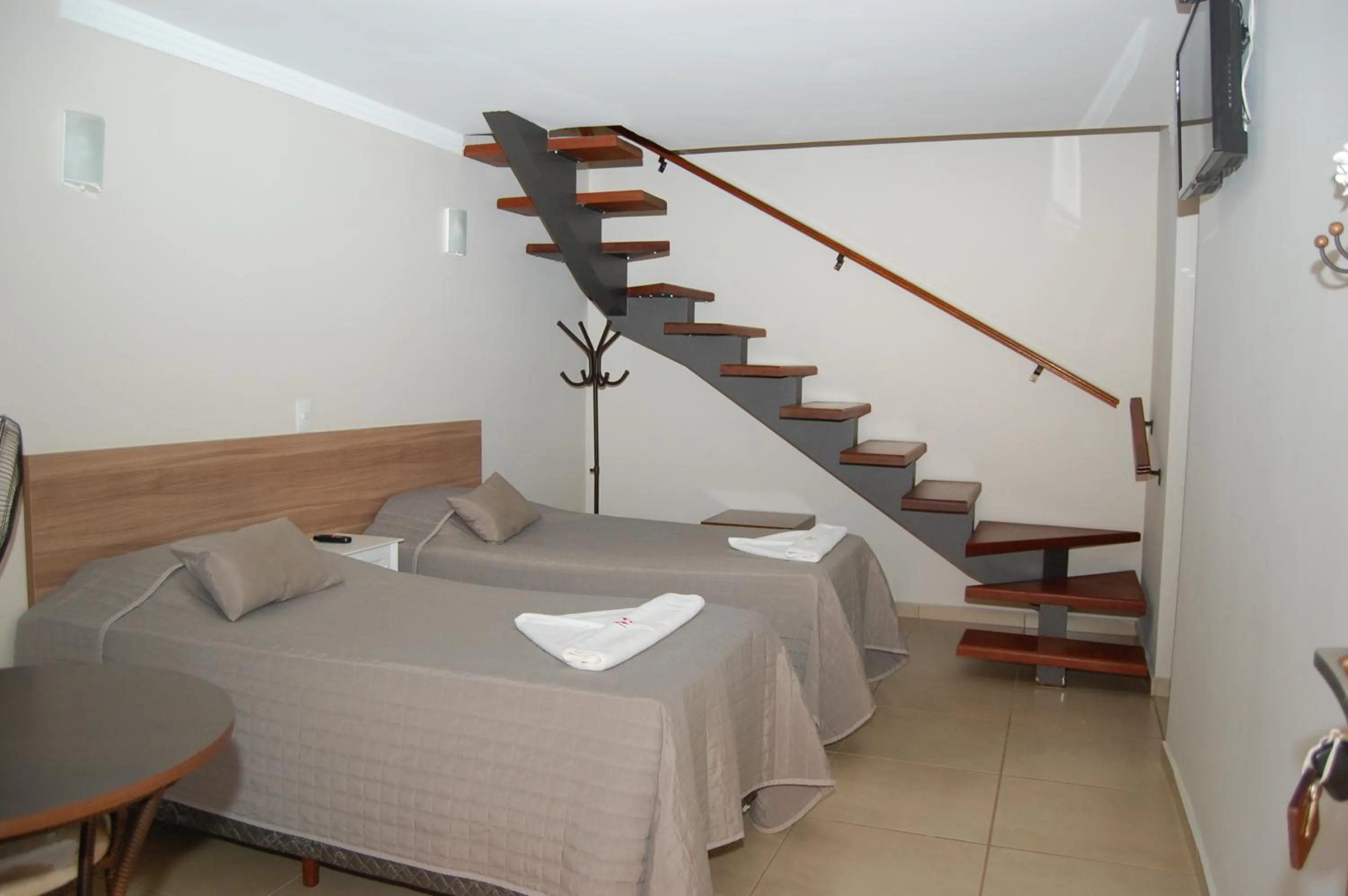 Bed in Pousada Nefelibatas