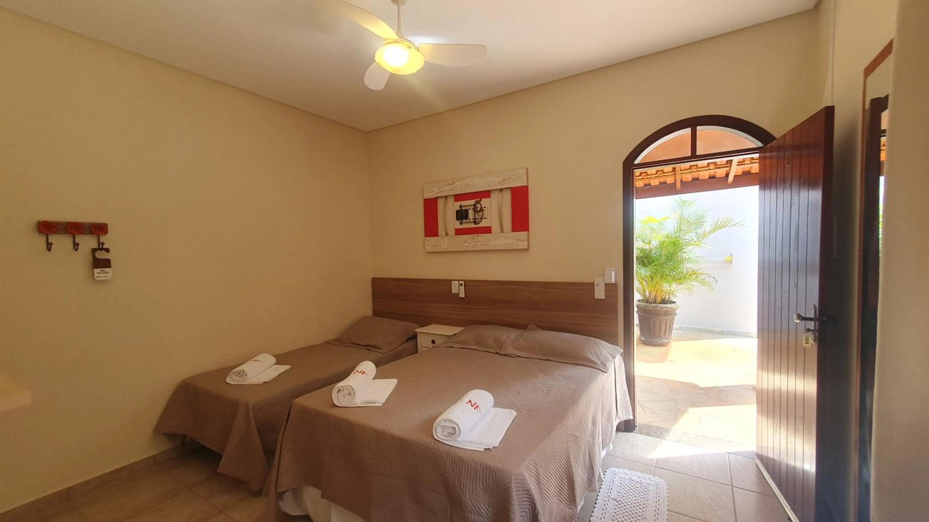 Bed in Pousada Nefelibatas