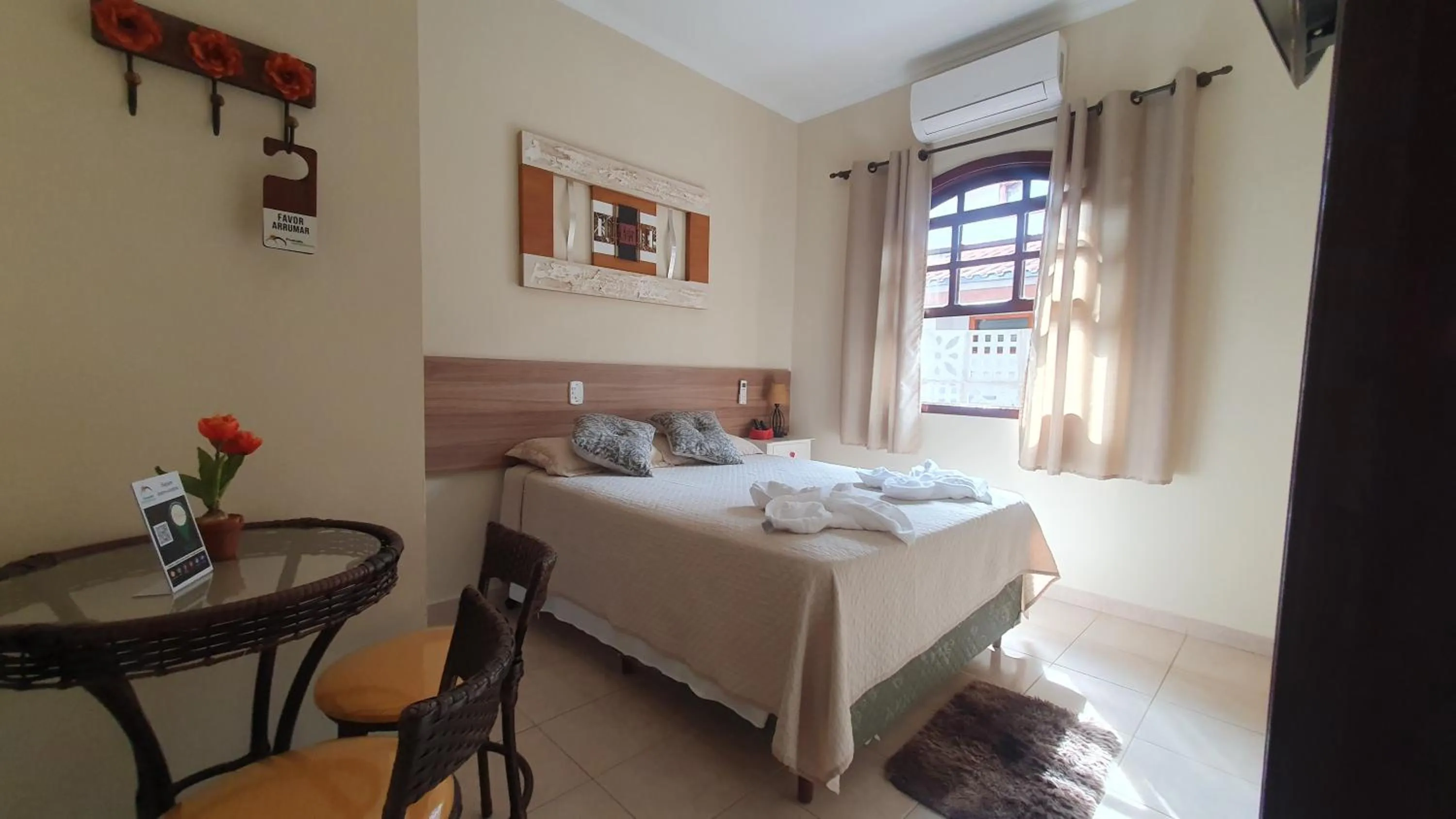 Bed in Pousada Nefelibatas