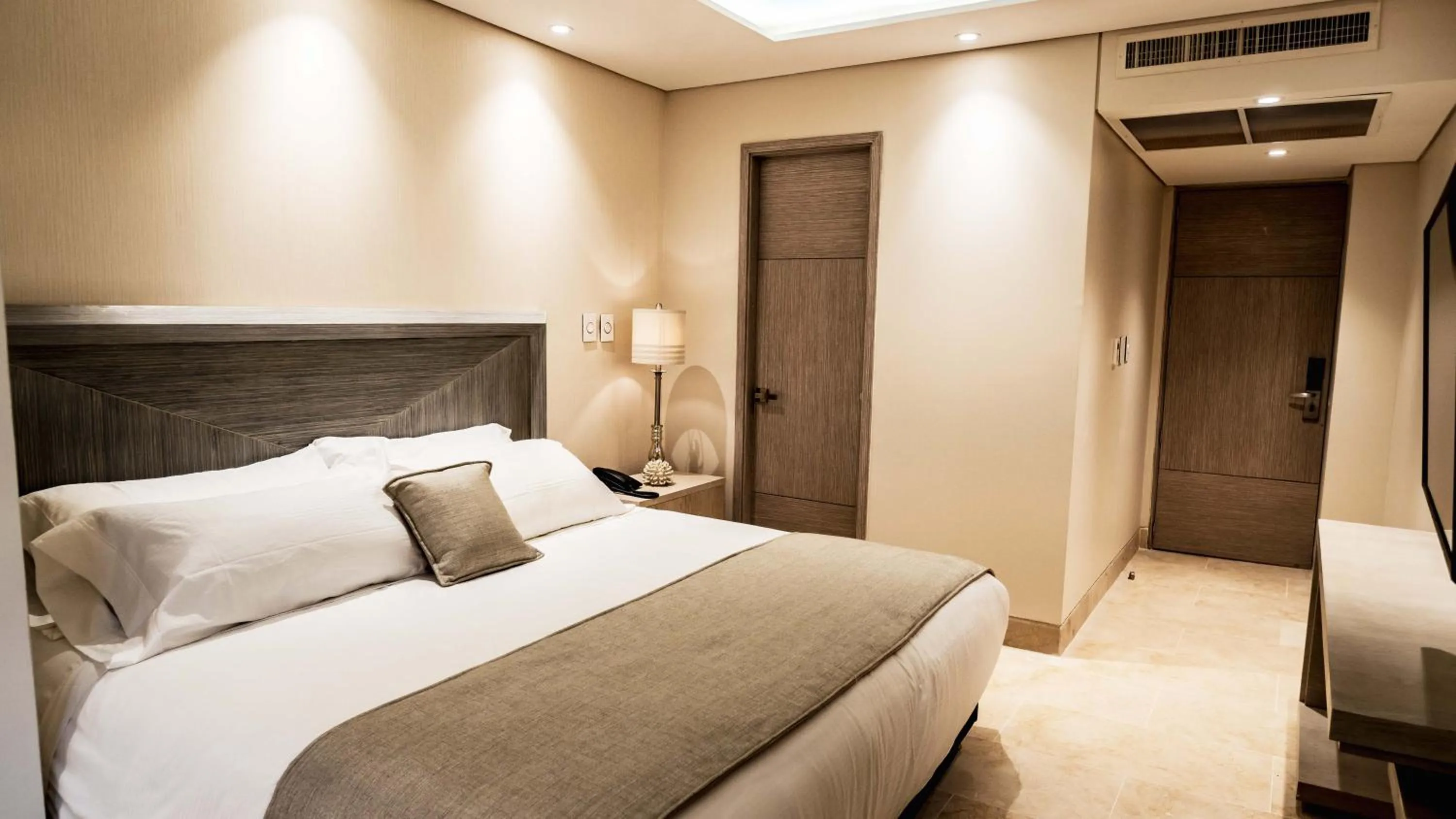 Bed in Alko Hotel Cotona