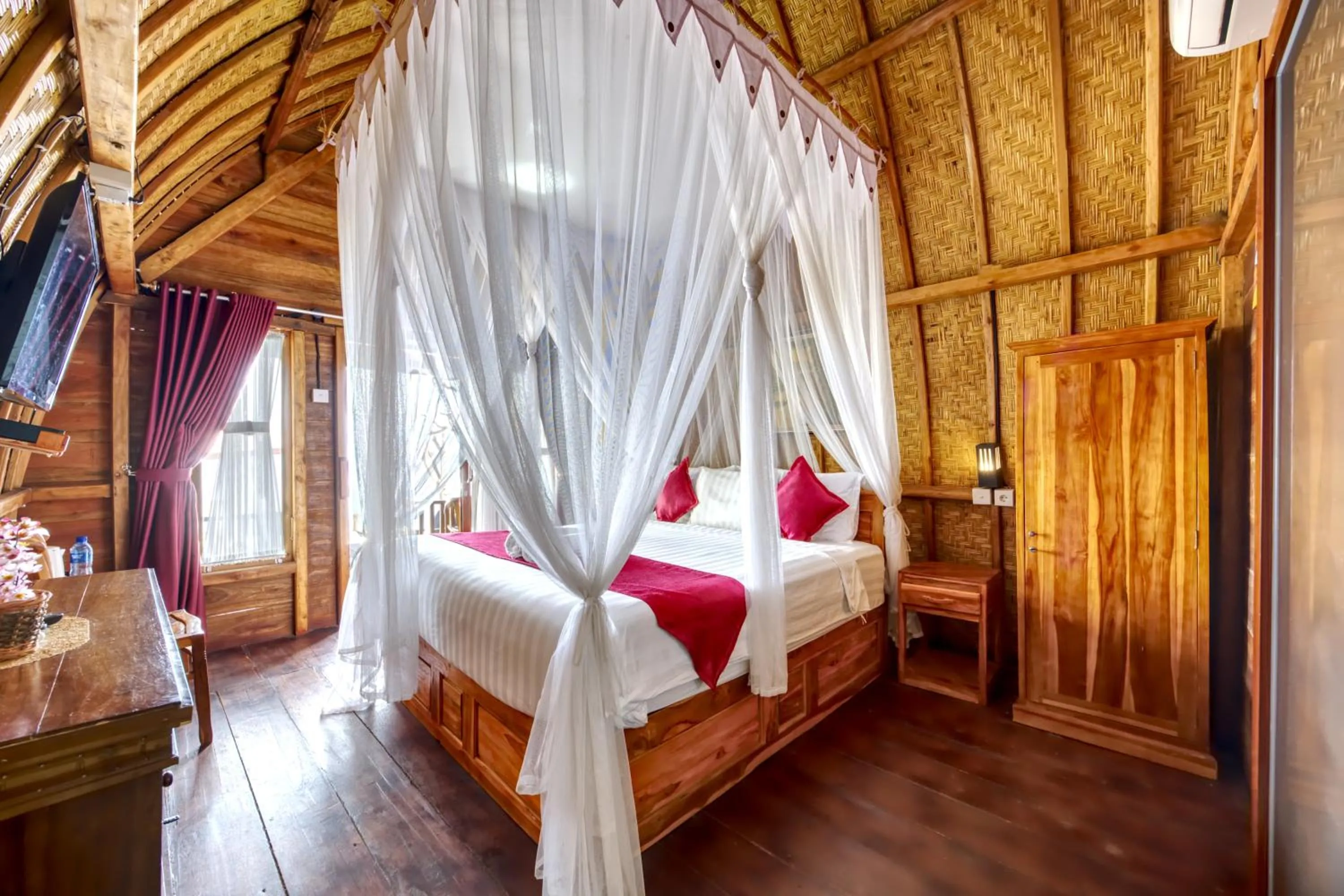 Bed in Santen Beach Bungalows