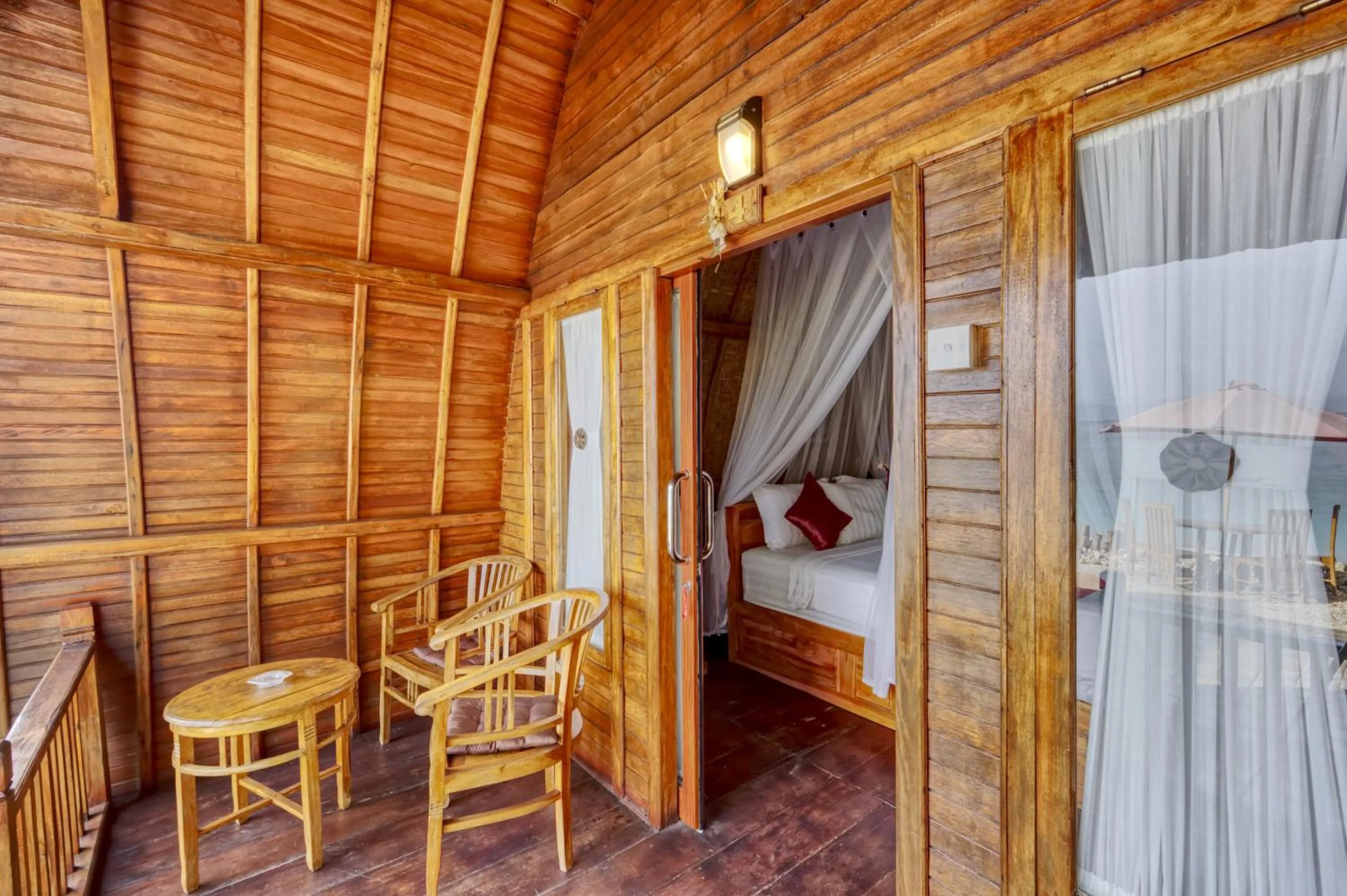 Patio, Bed in Santen Beach Bungalows