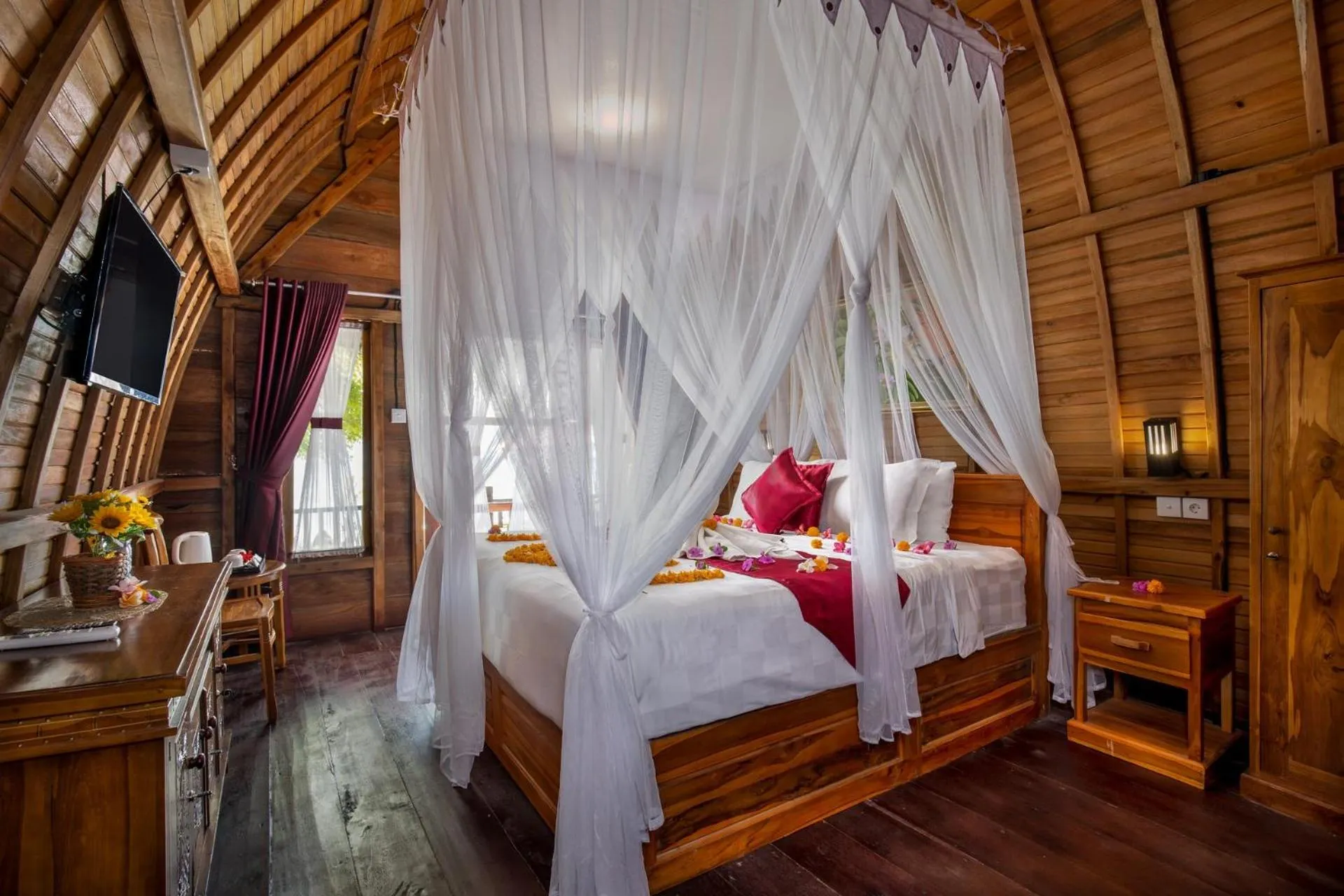 Bed in Santen Beach Bungalows
