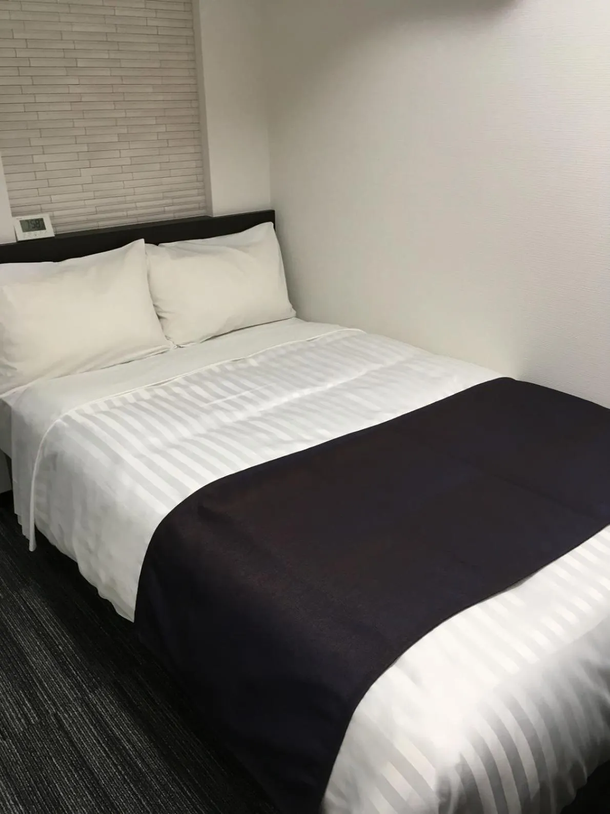 Bed in Shinbashi Urban Hotel