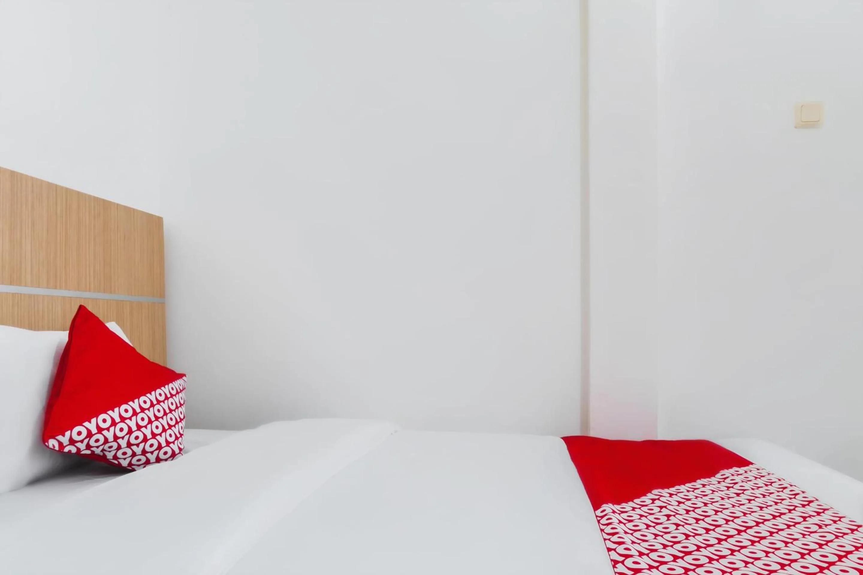 Bedroom in SUPER OYO 617 Sukaraja Residence Syariah