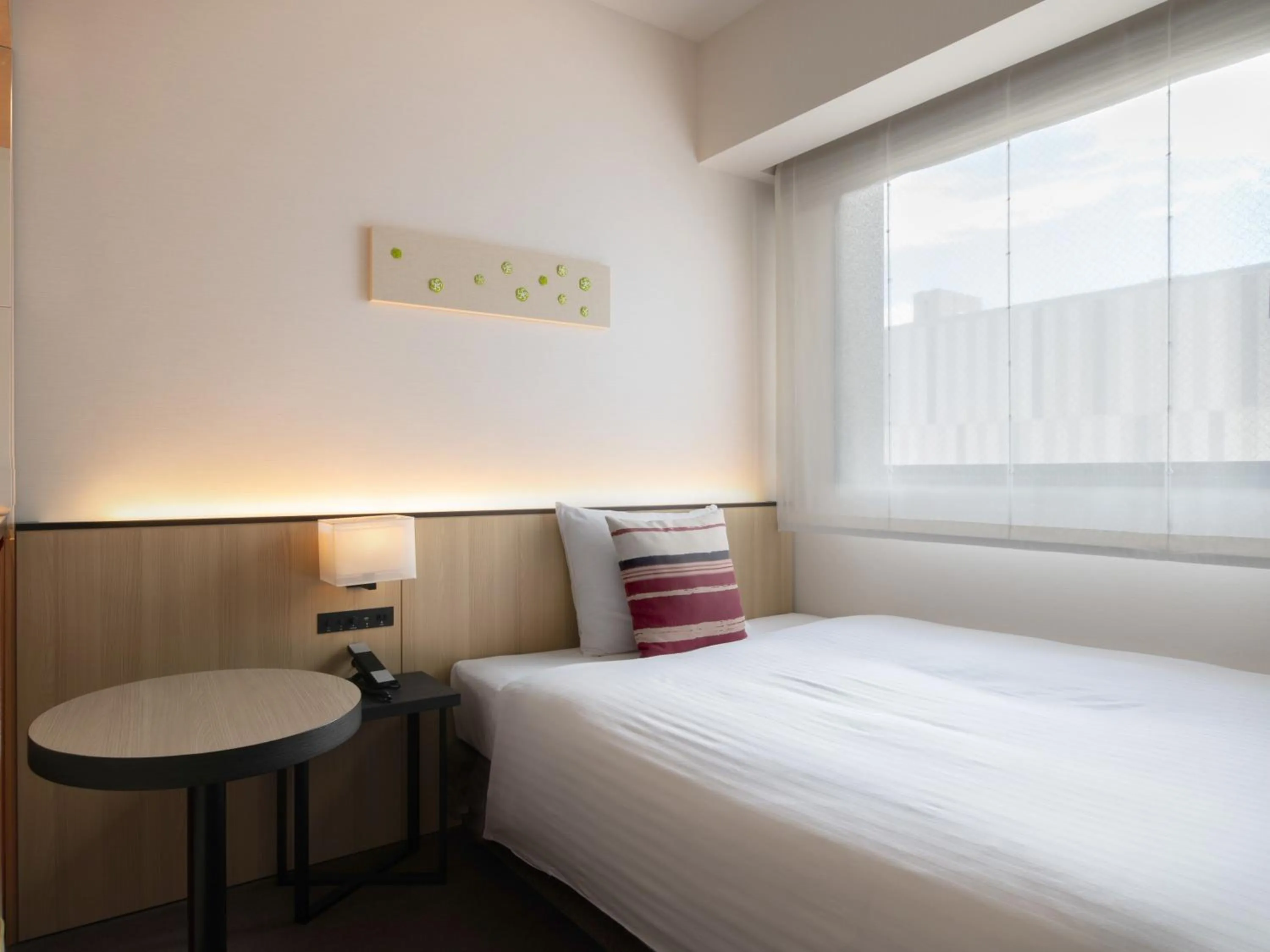 Photo of the whole room, Bed in Hotel Vista Fukuoka Nakasu-Kawabata