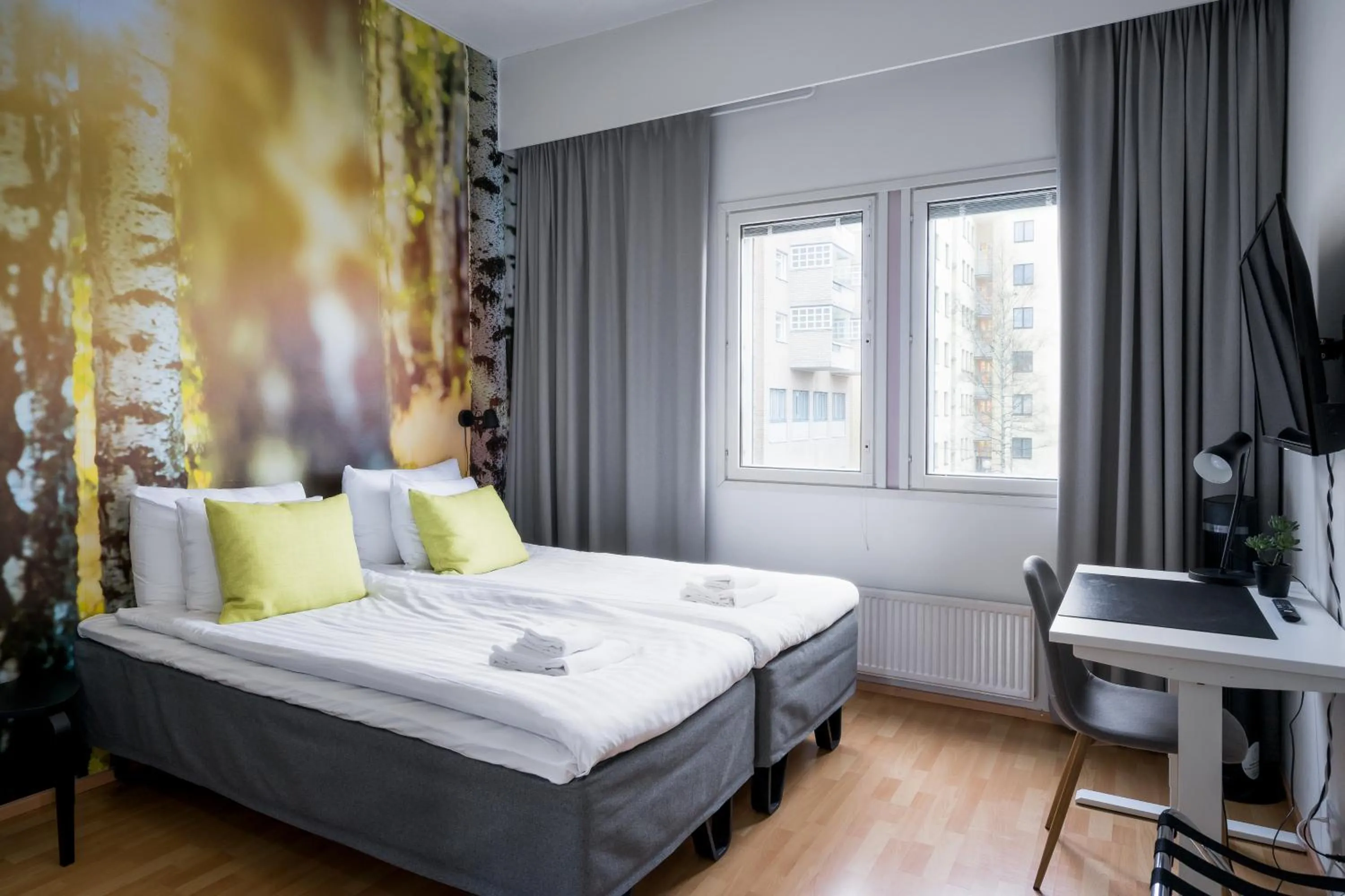 Bed in Hiisi Hotel Lohja