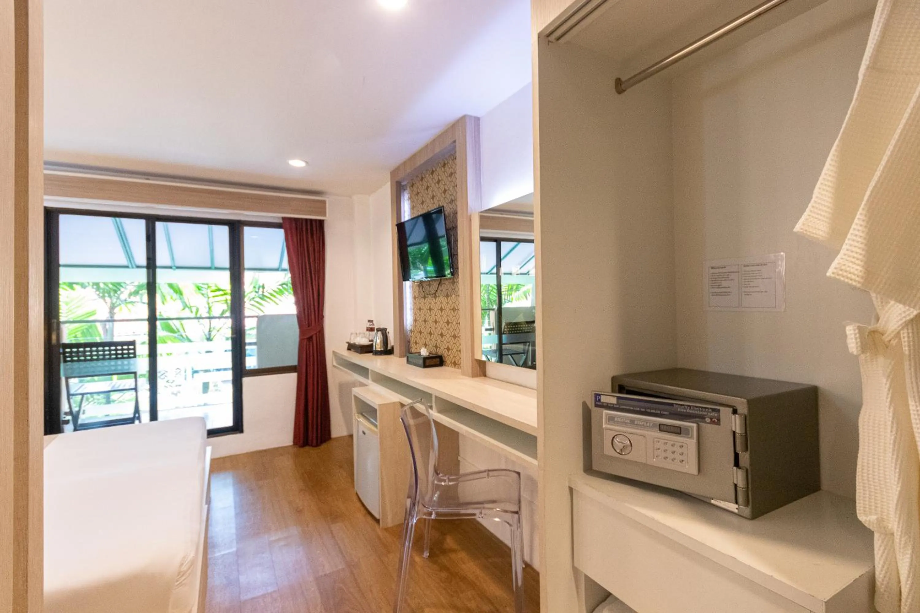 TV and multimedia in Aochalong Villa Resort & Spa - SHA Plus