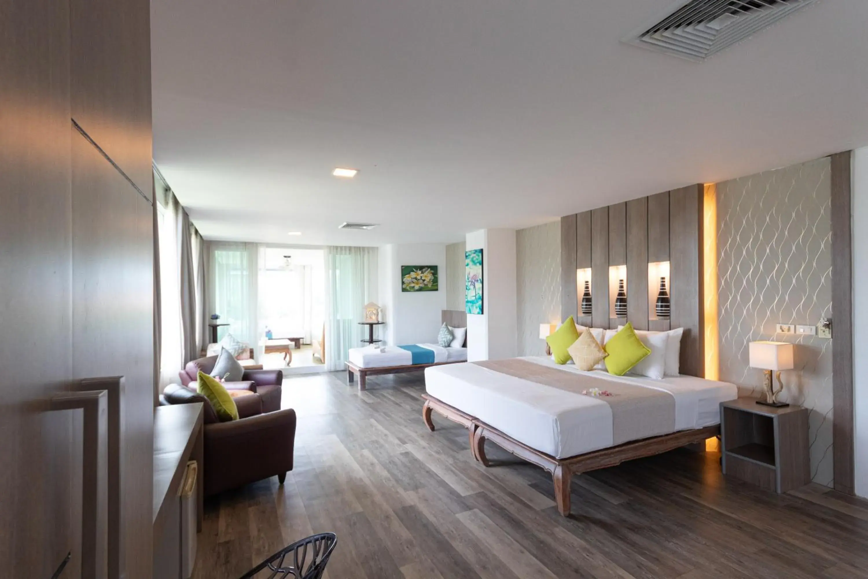 Seating area, Bed in Aochalong Villa Resort & Spa - SHA Plus Seating area, Bed in Aochalong Villa Resort & Spa - SHA Plus