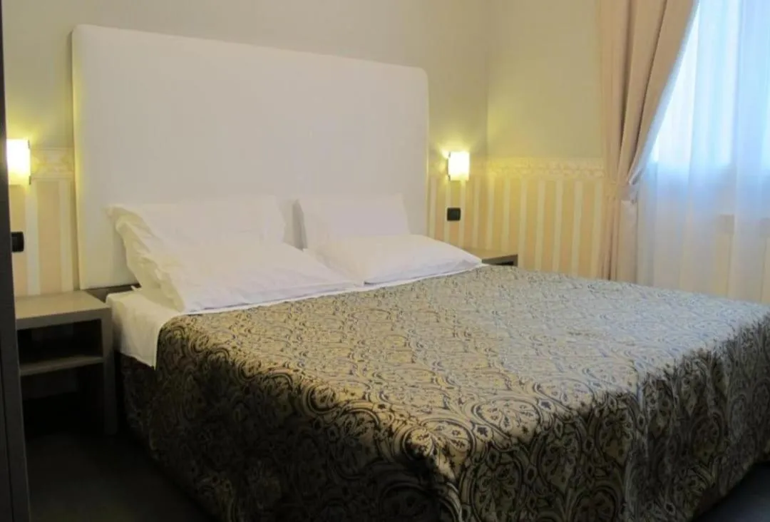 Bed in Hotel Laguna Residence