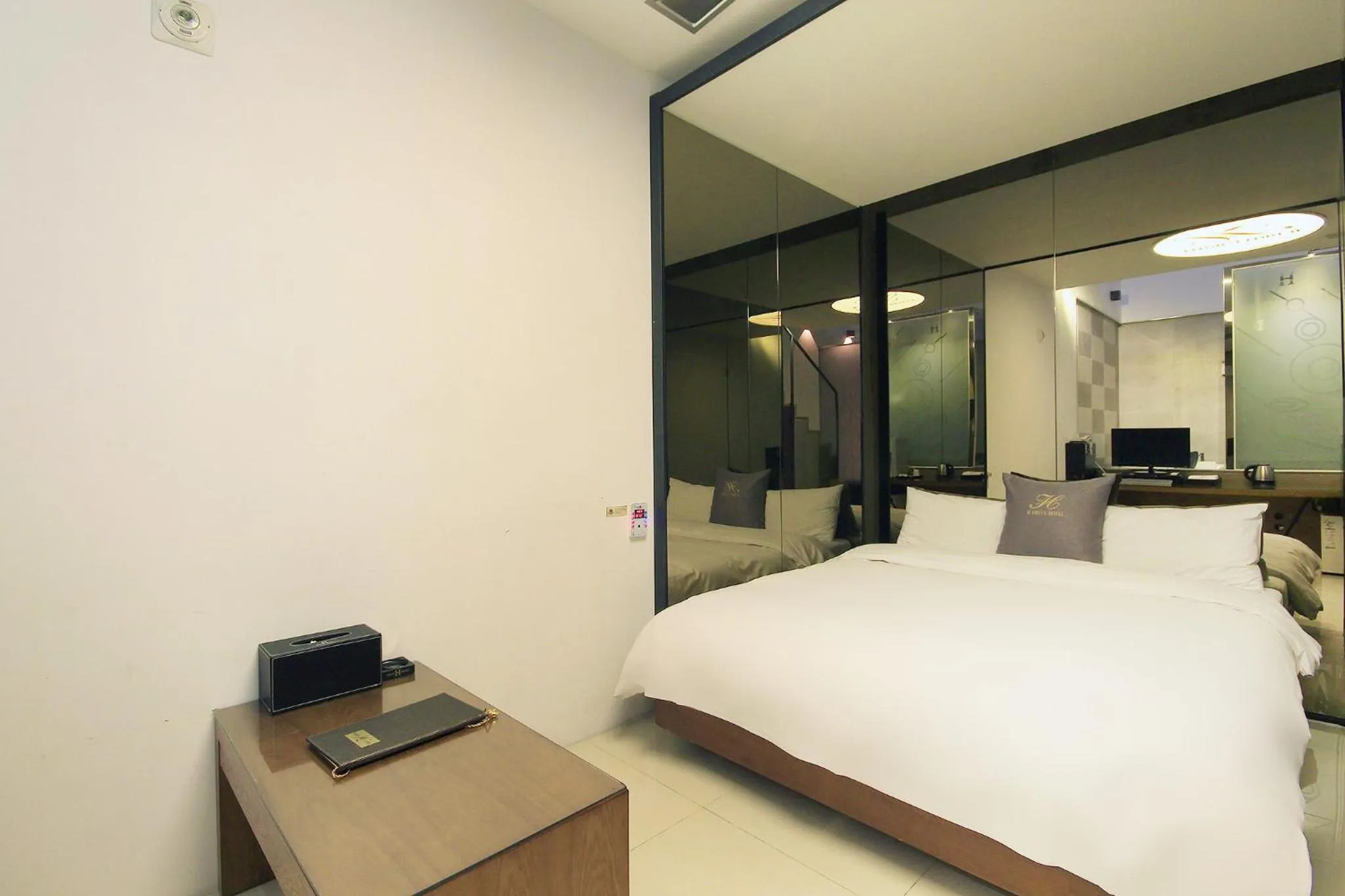 Bed in H Drive Hotel