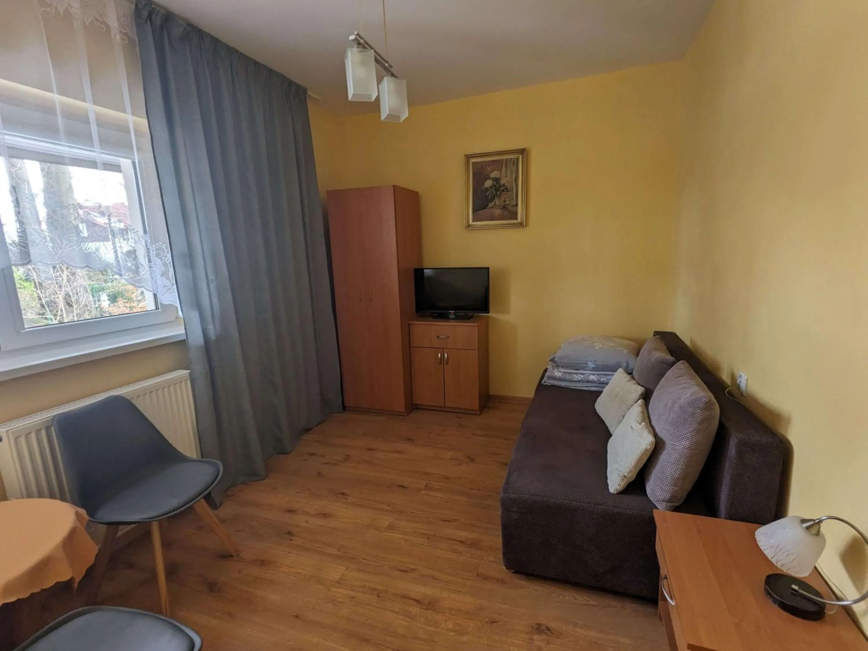 Communal lounge/ TV room in Dom wczasowy Przy Skałkach