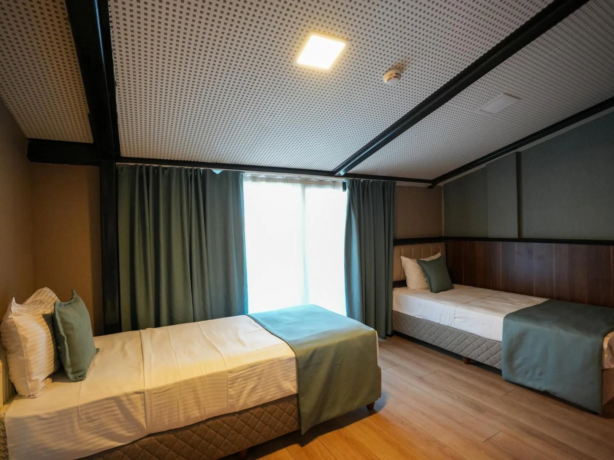 Bed in Valens Hotel Downtown