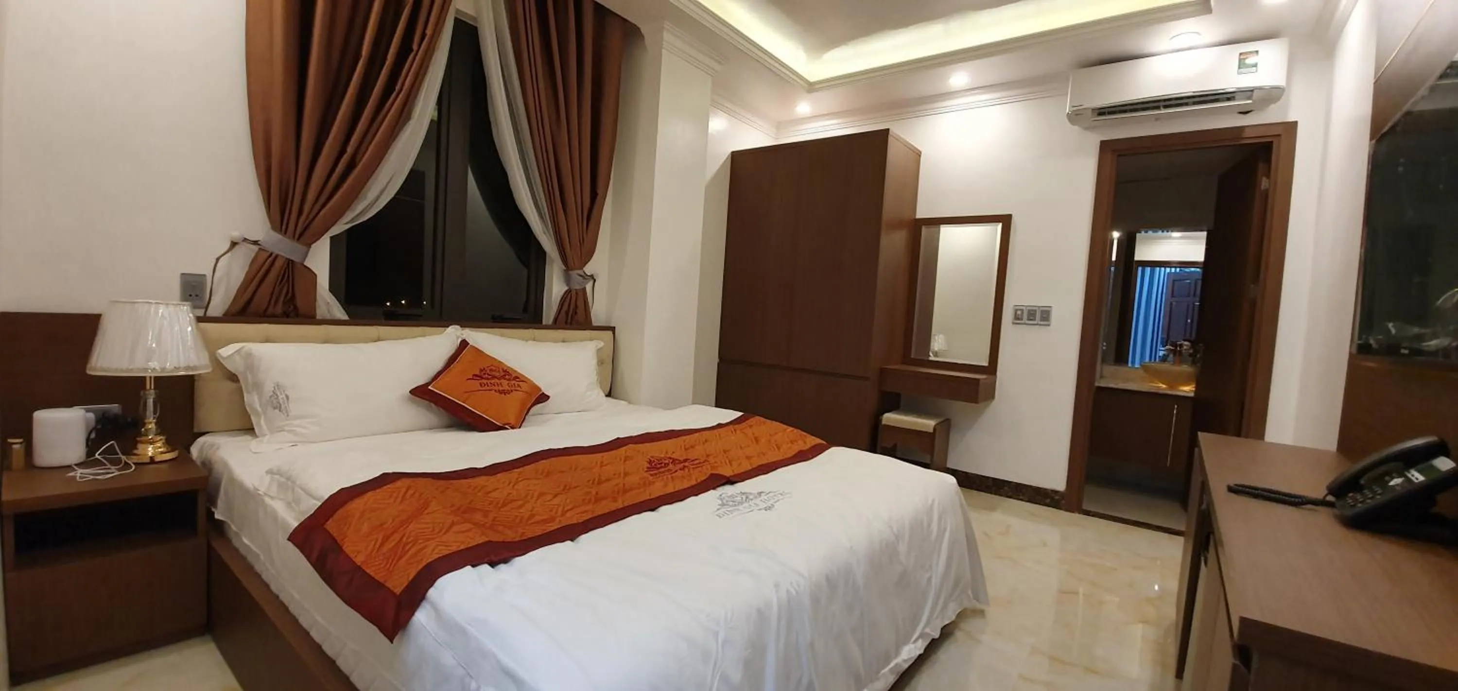 Bed in Đinh Gia Hotel