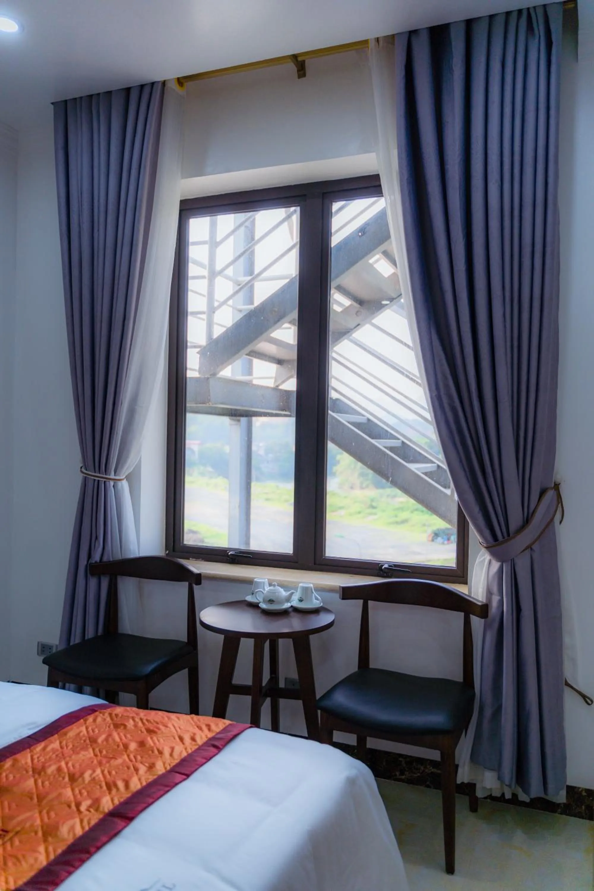 Seating area, Bed in Đinh Gia Hotel