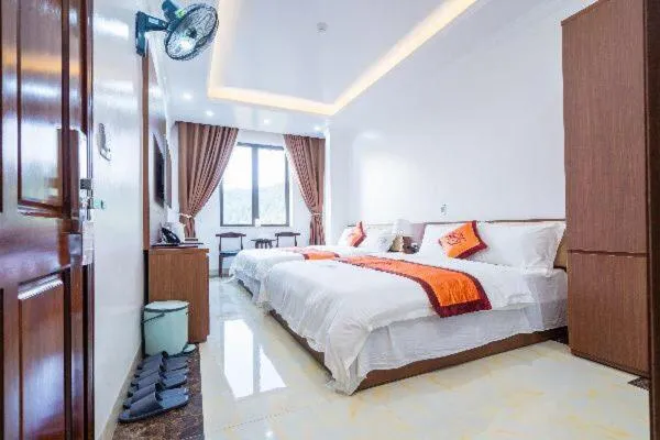 Bed in Đinh Gia Hotel