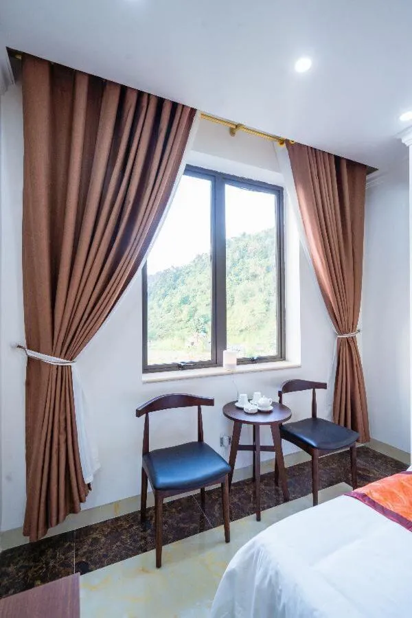 Living room, Bed in Đinh Gia Hotel