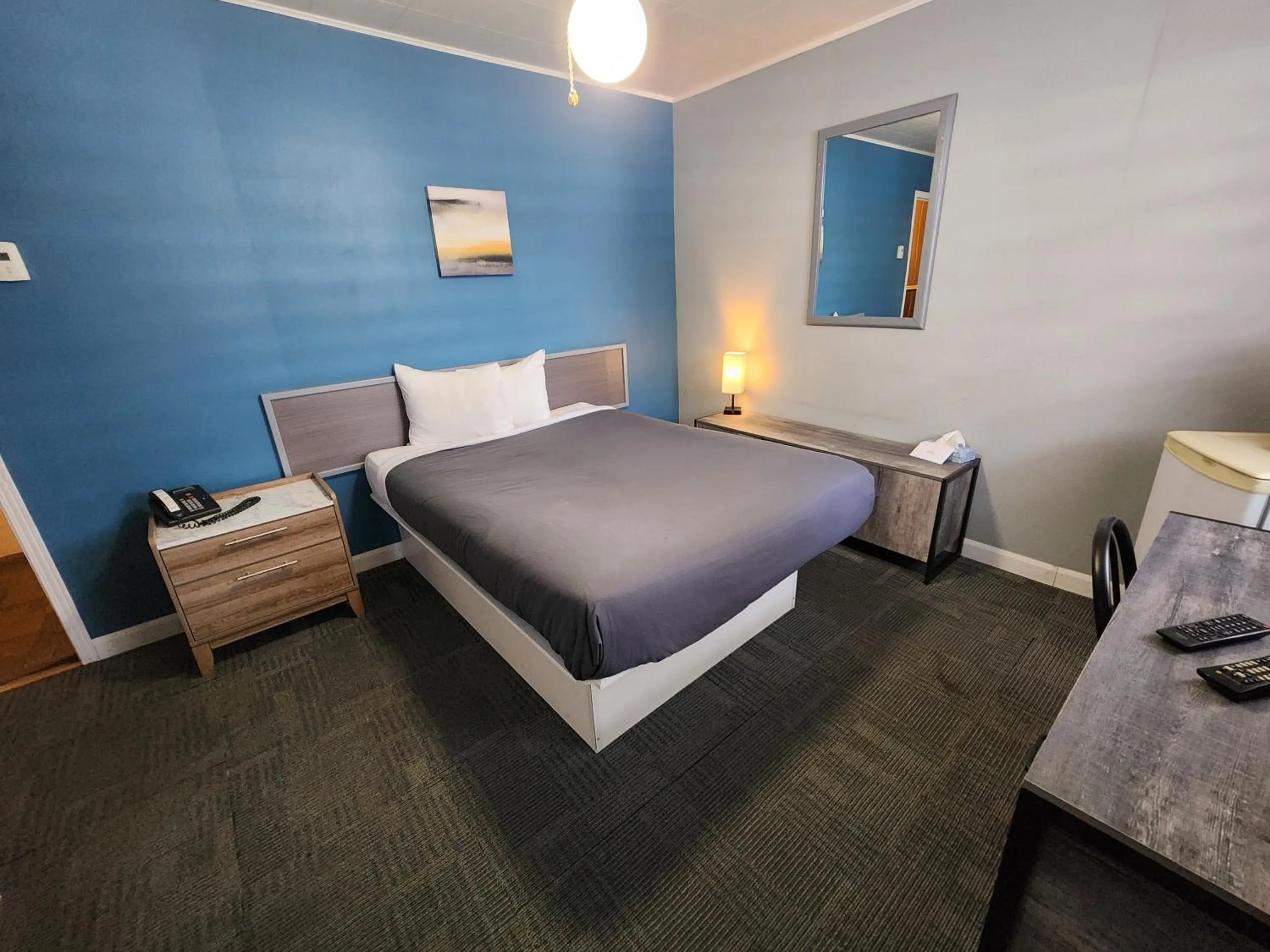 Bed in Motel Le Victo