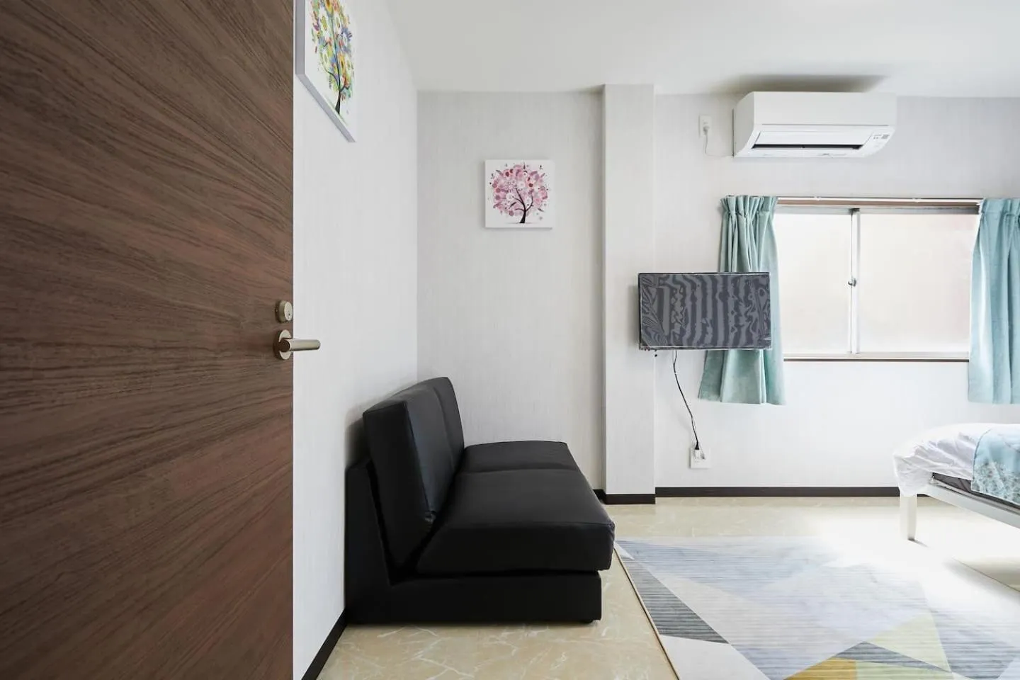 Bed in Mitsuba Guest House