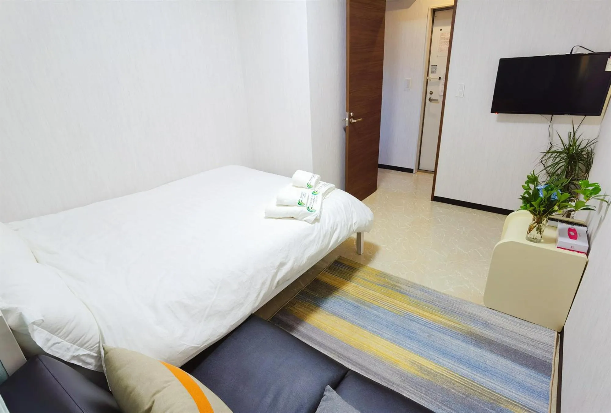 Bed in Mitsuba Guest House