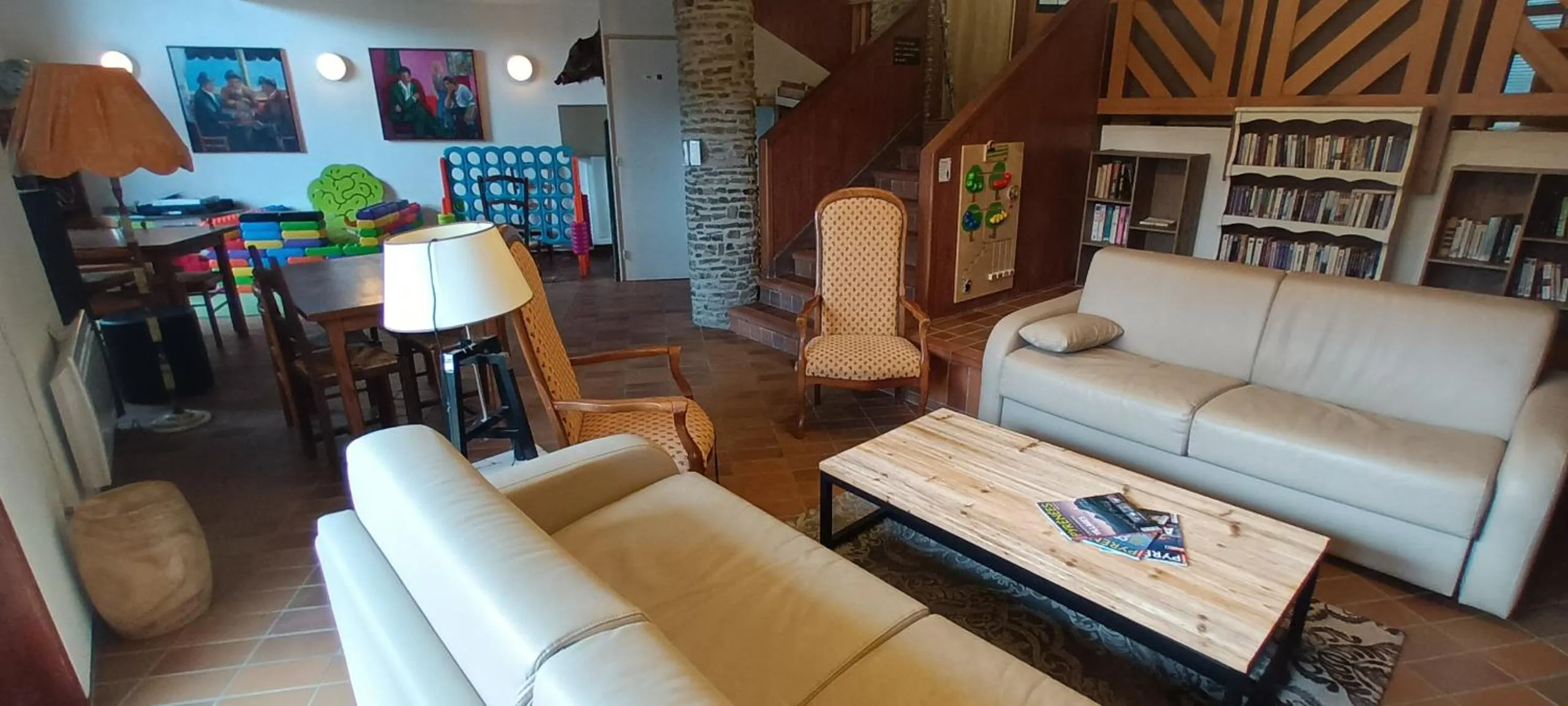 Communal lounge/ TV room in VVF Résidence Les Angles Pyrénées