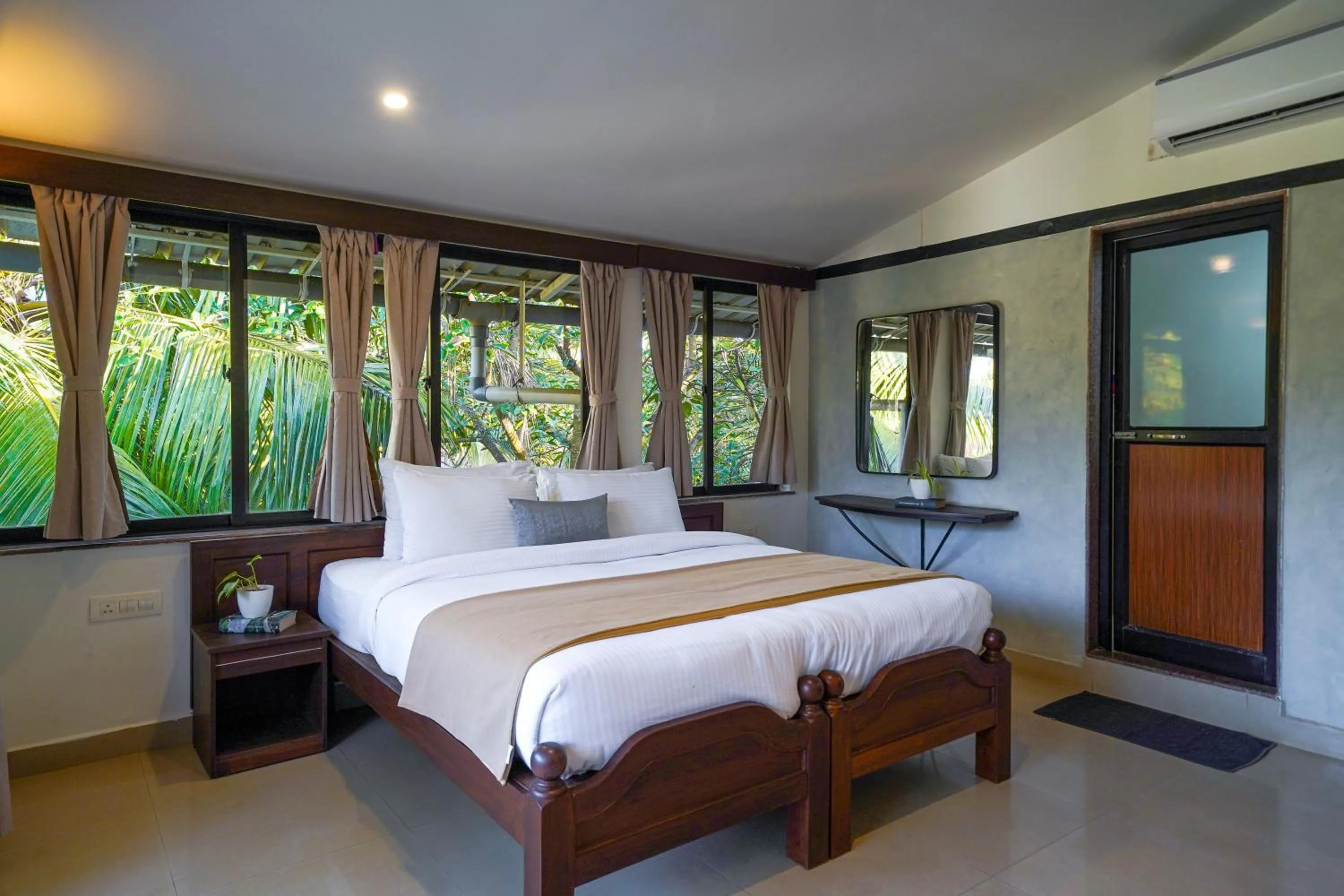 Bed in Olive Hotel Alidia Beach Resort by Embassy Group