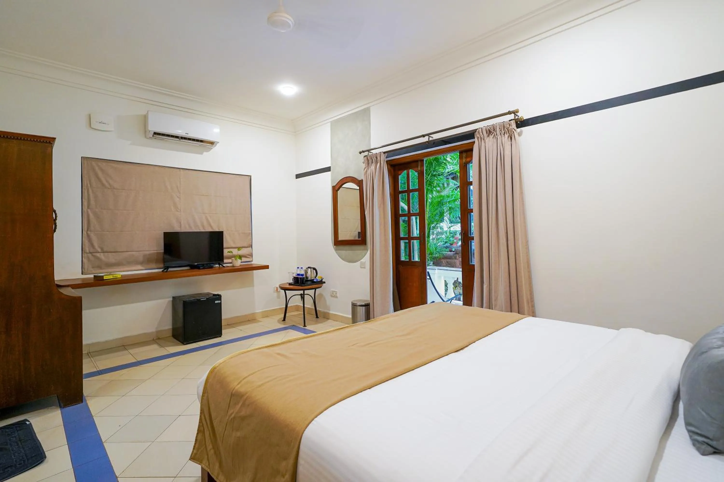 Bed in Olive Hotel Alidia Beach Resort by Embassy Group