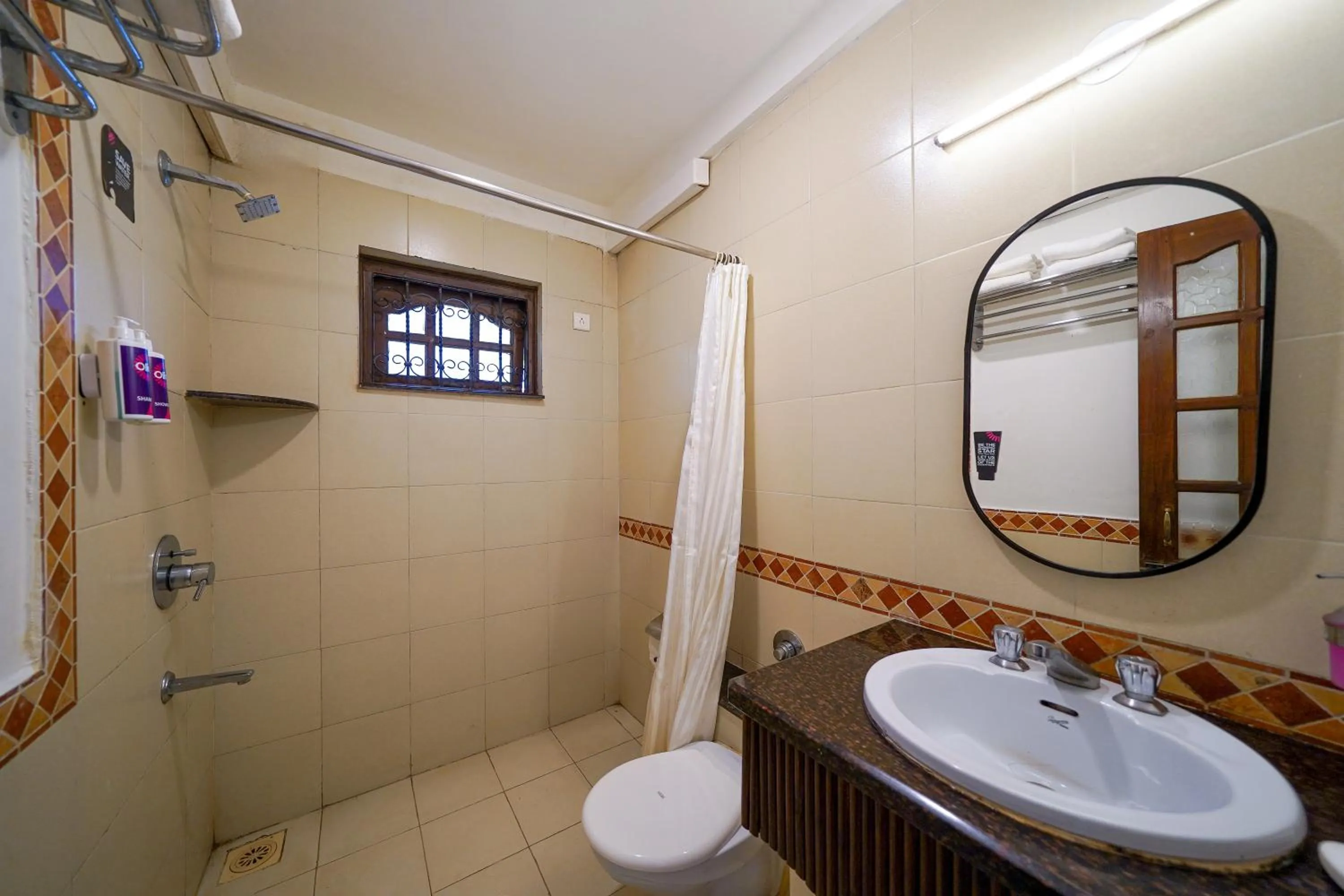 Shower in Olive Hotel Alidia Beach Resort by Embassy Group