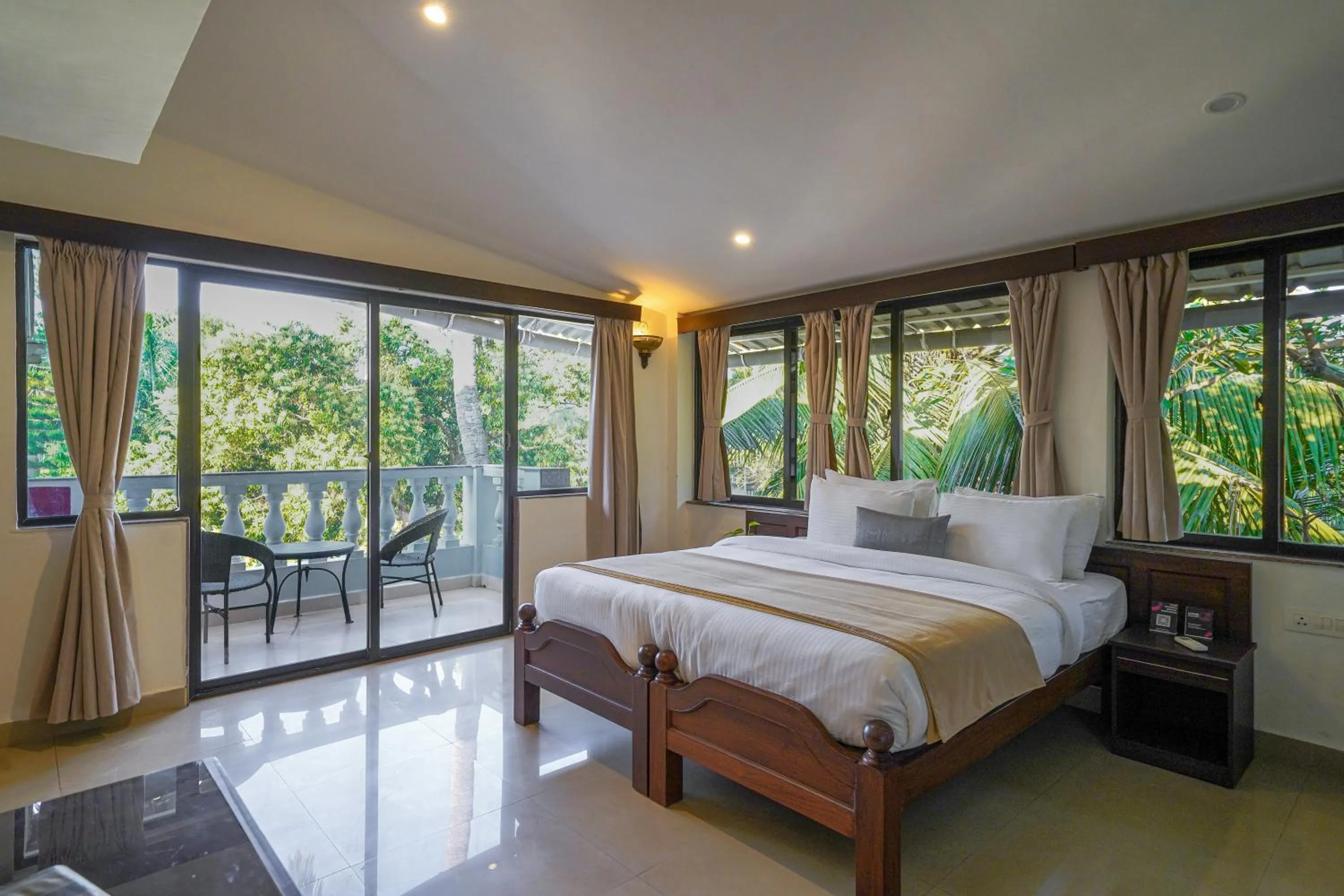 Bed in Olive Hotel Alidia Beach Resort by Embassy Group