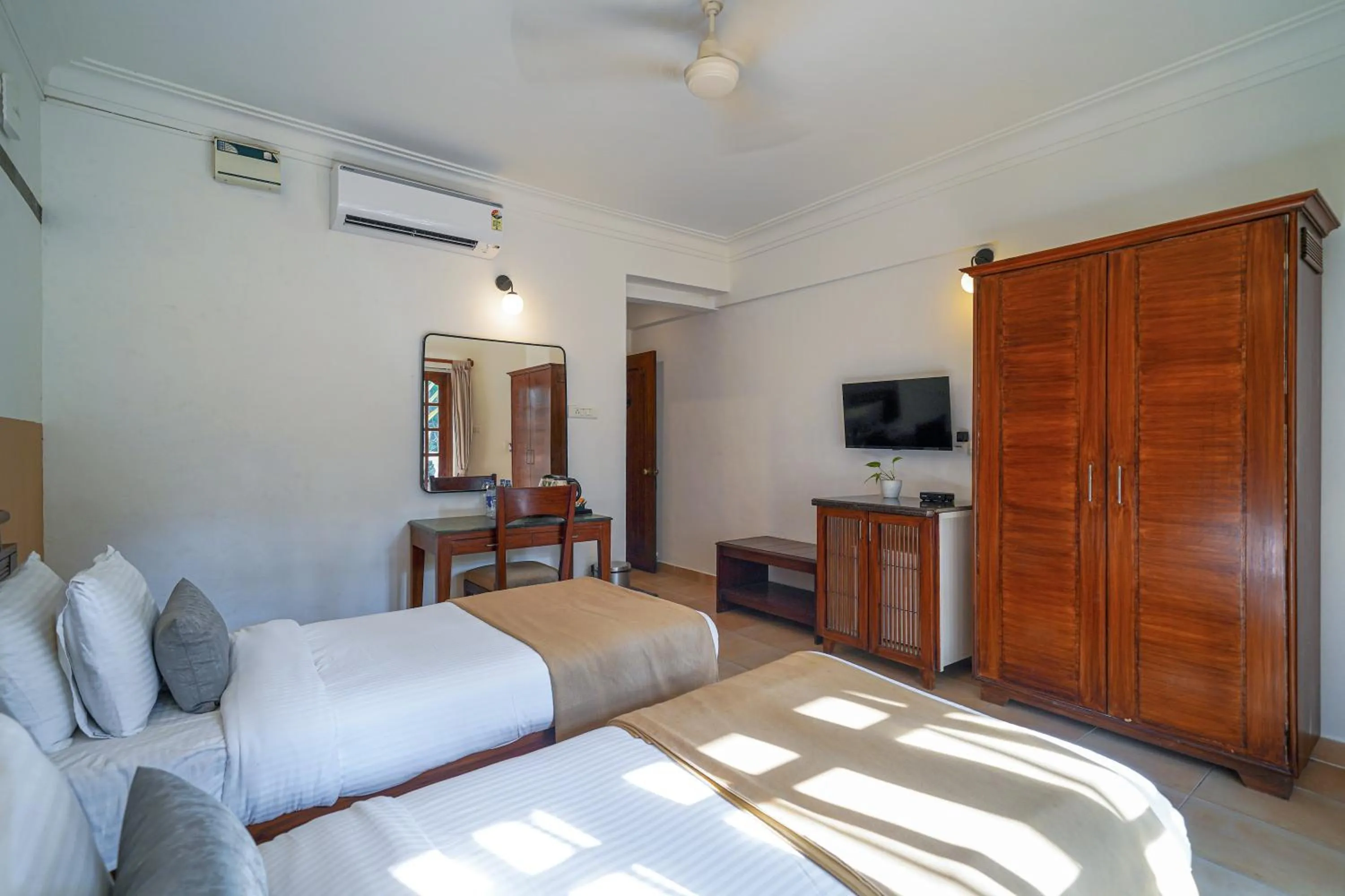 Bed in Olive Hotel Alidia Beach Resort by Embassy Group