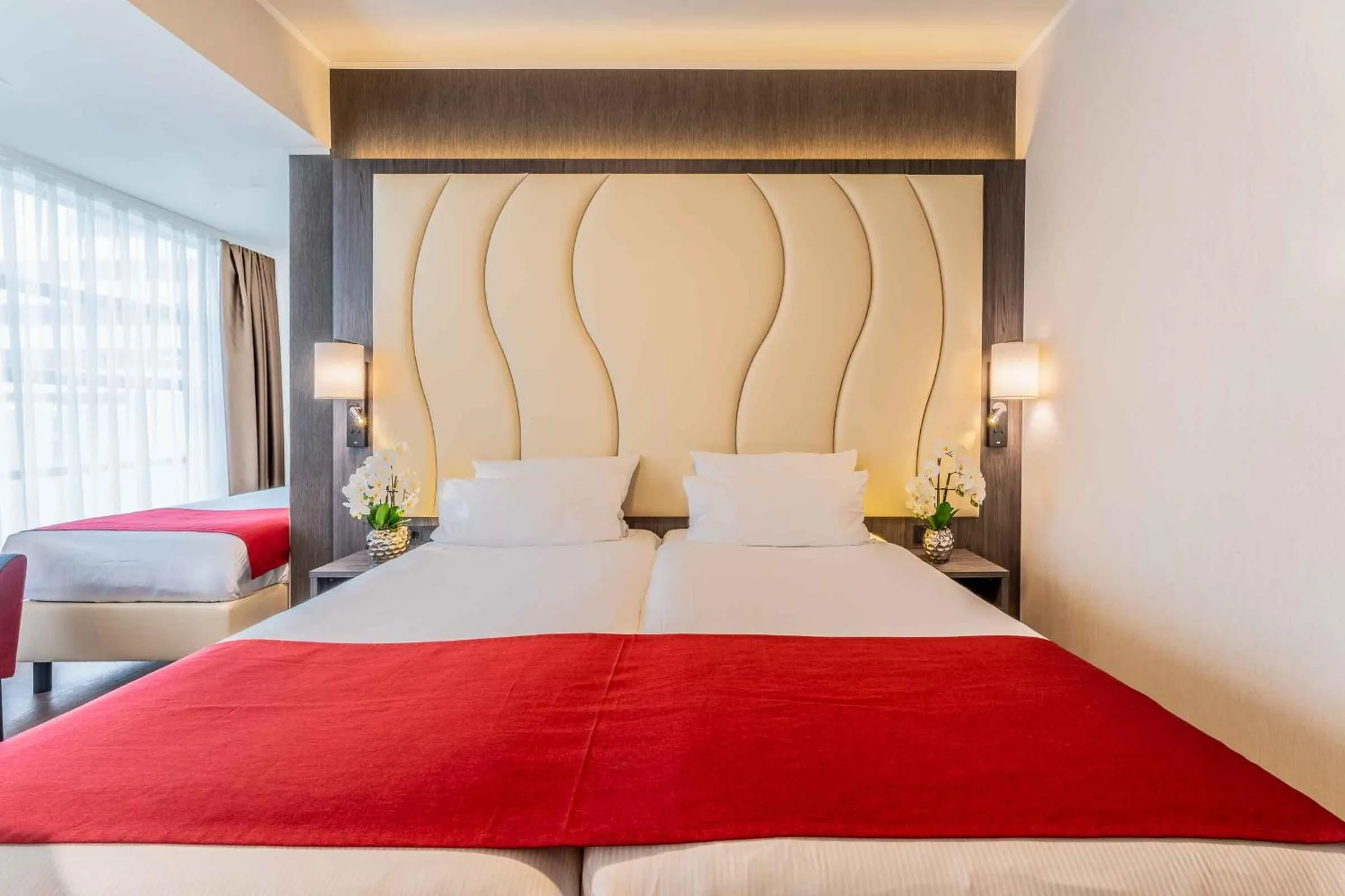 Bed in PLAZA Premium Den Haag City Center