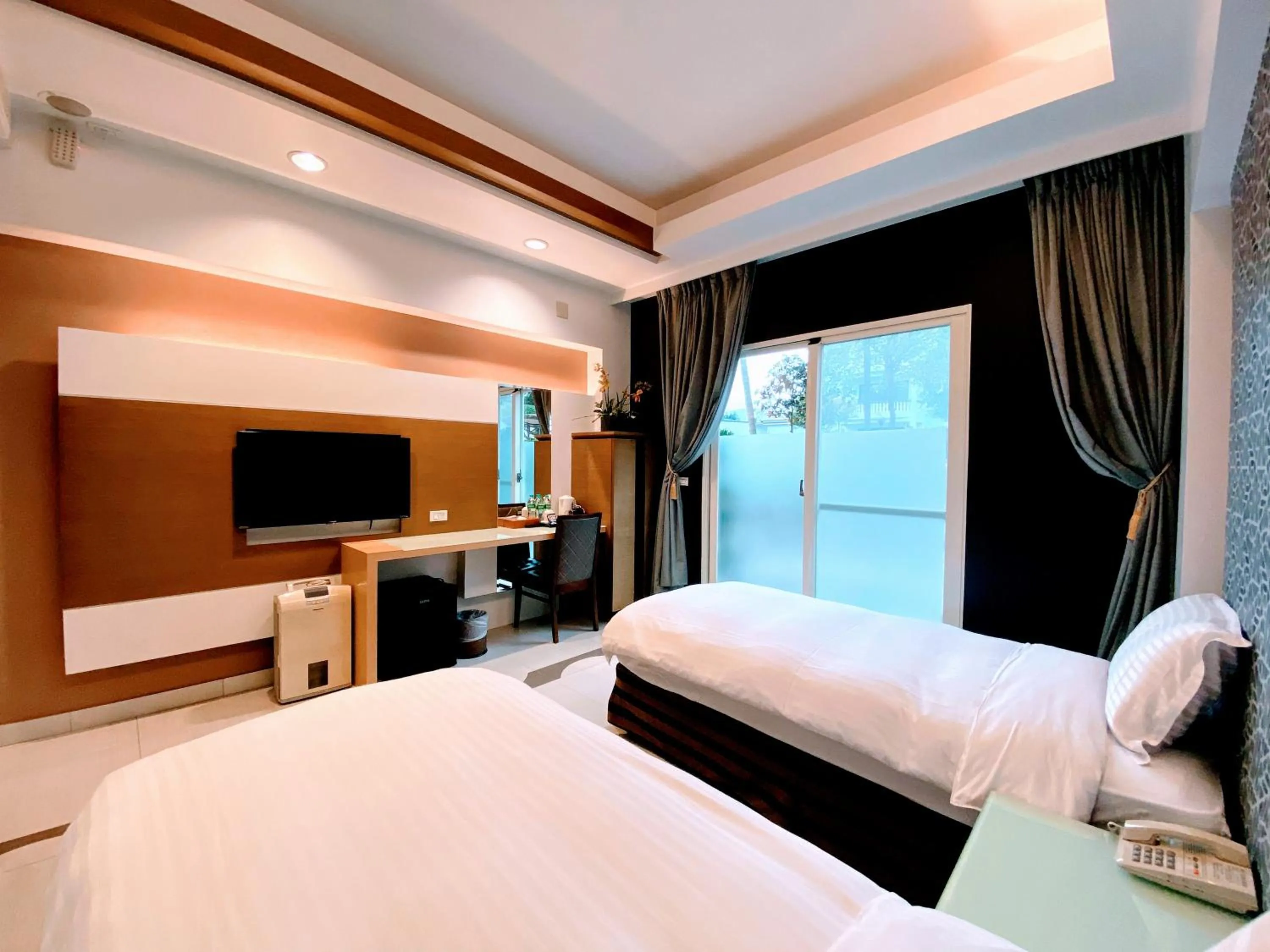 Bed in Spring Fountain Hotel