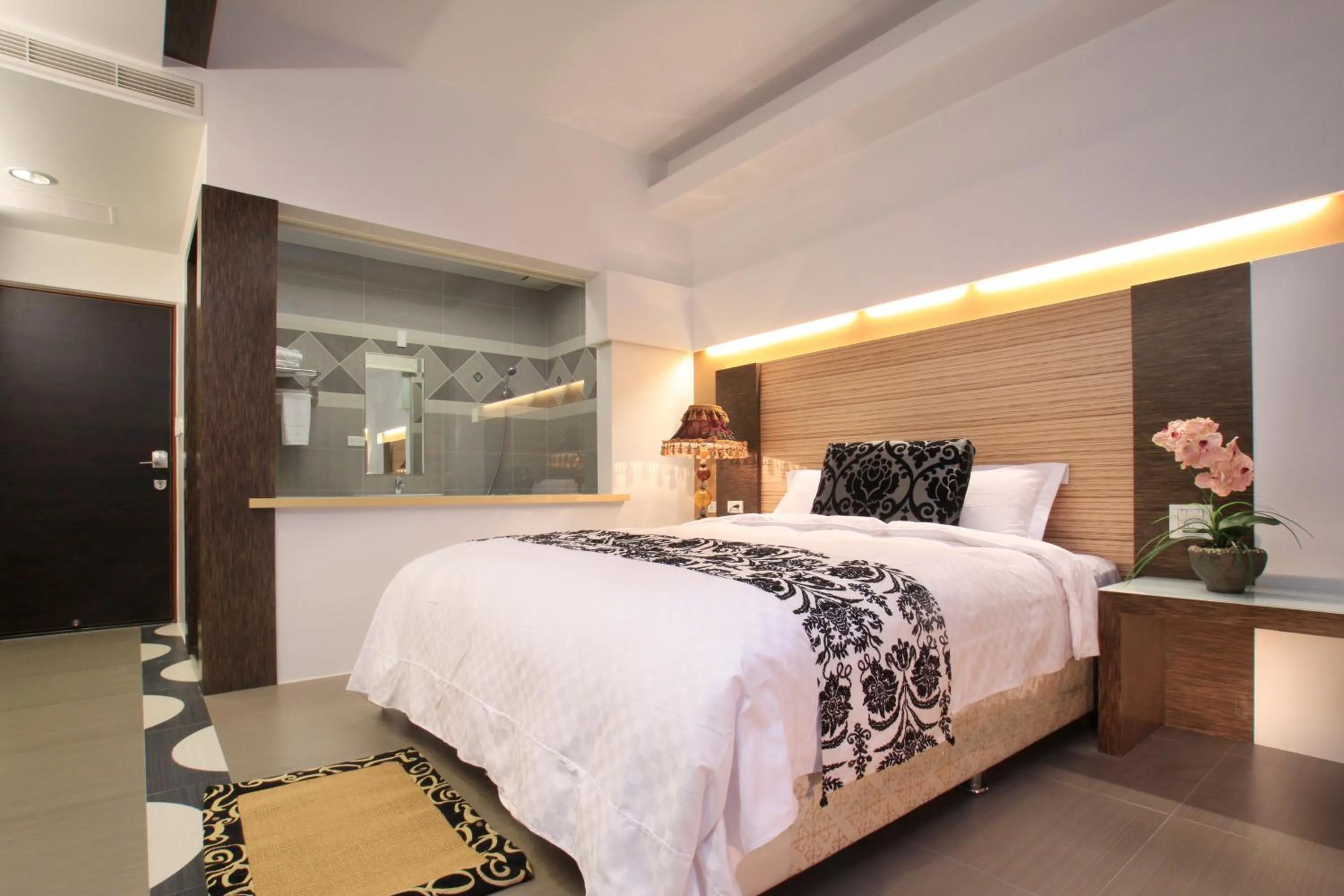 Bed in Spring Fountain Hotel