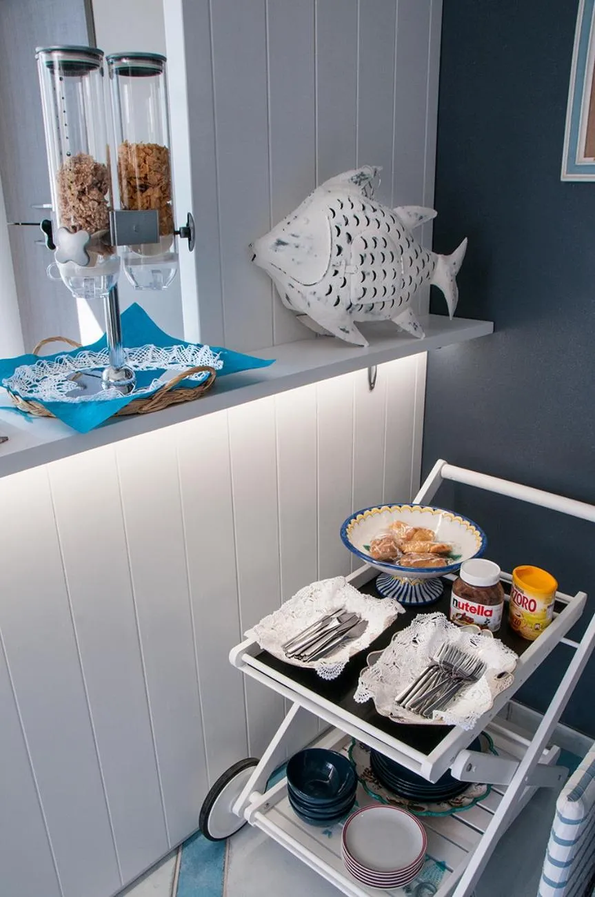 Communal lounge/ TV room in B&B Amalfè