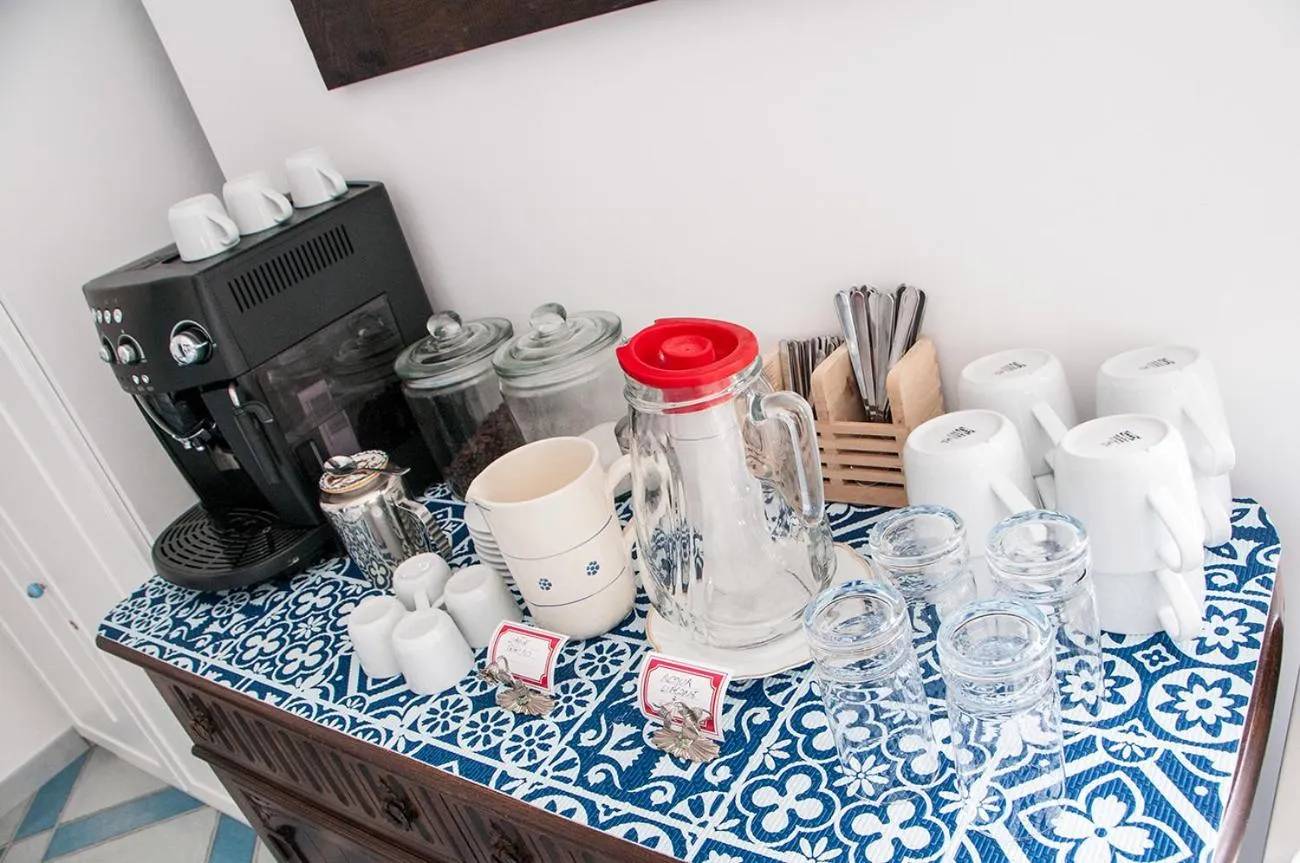 Communal lounge/ TV room in B&B Amalfè