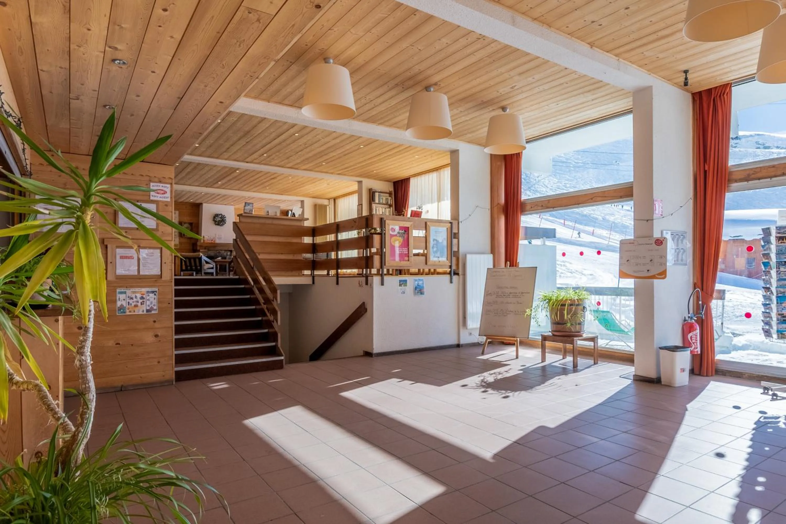 Lobby or reception in Résidence Pierre & Vacances Le Gypaète