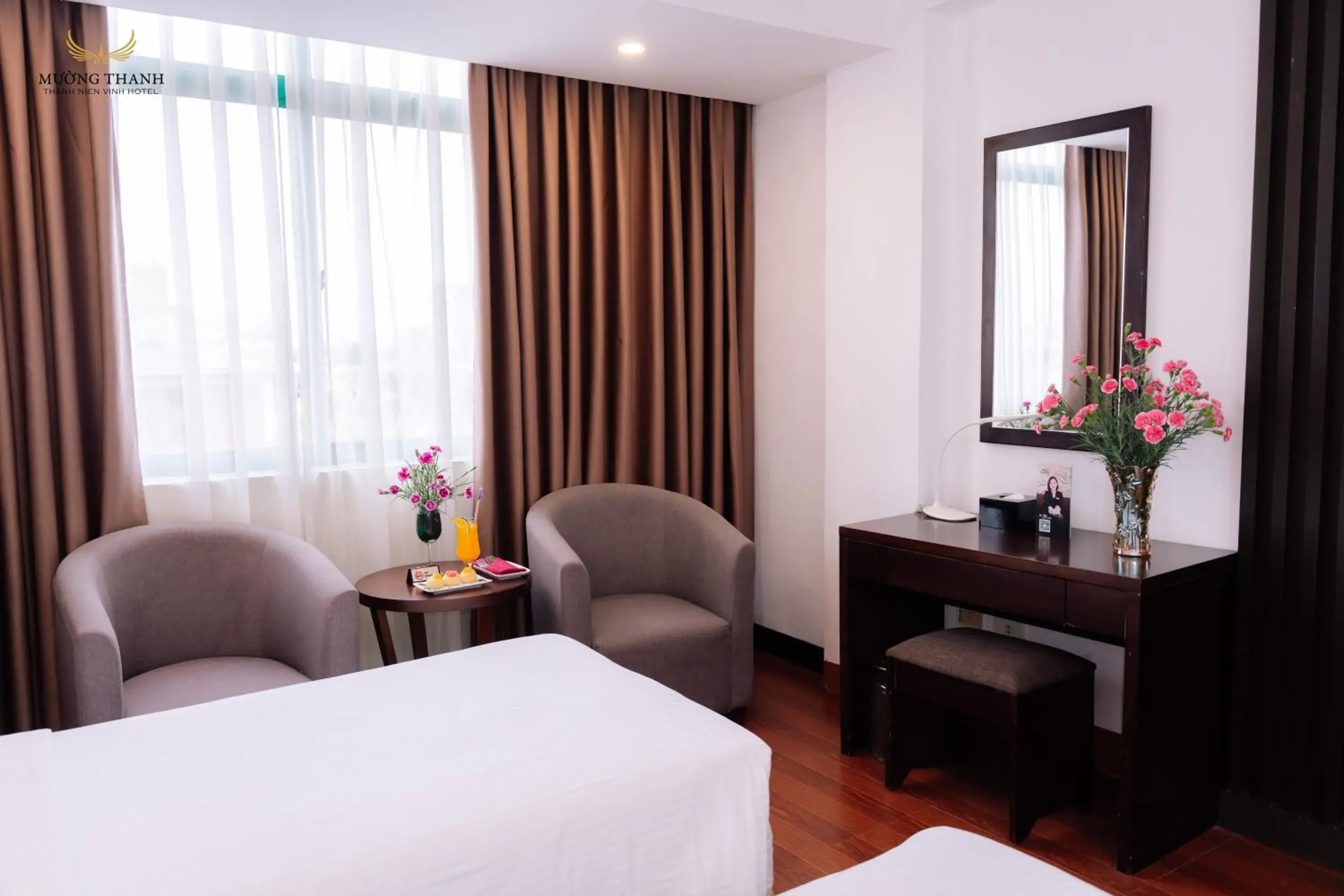 Seating area, Bed in Muong Thanh Thanh Nien Vinh Seating area, Bed in Muong Thanh Thanh Nien Vinh