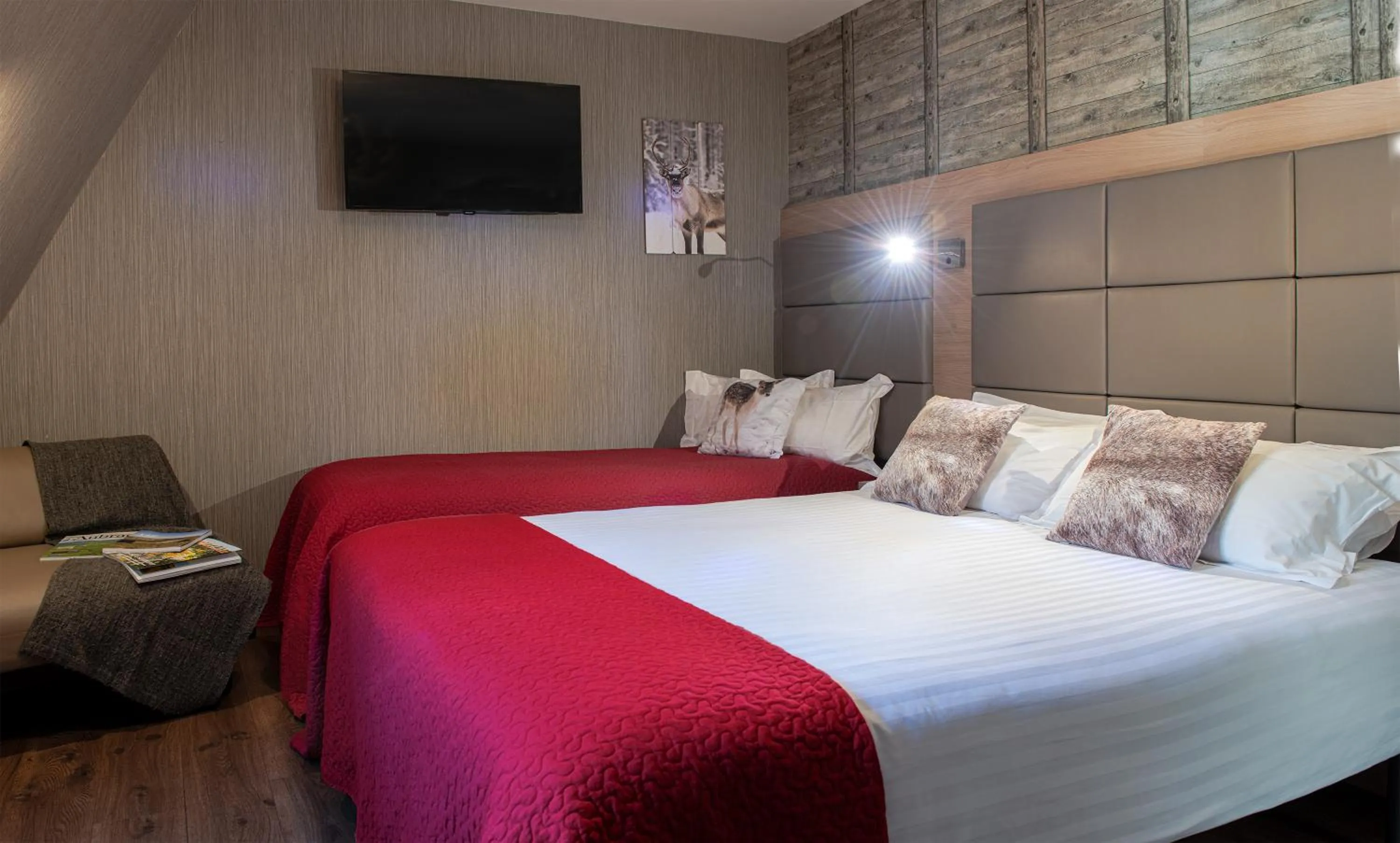 Bed in Logis Hôtel-restaurant Les Coudercous