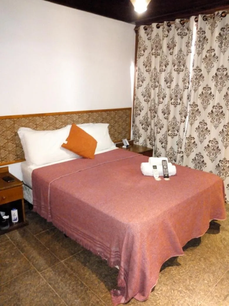 Bed in El Uru Suite Hotel