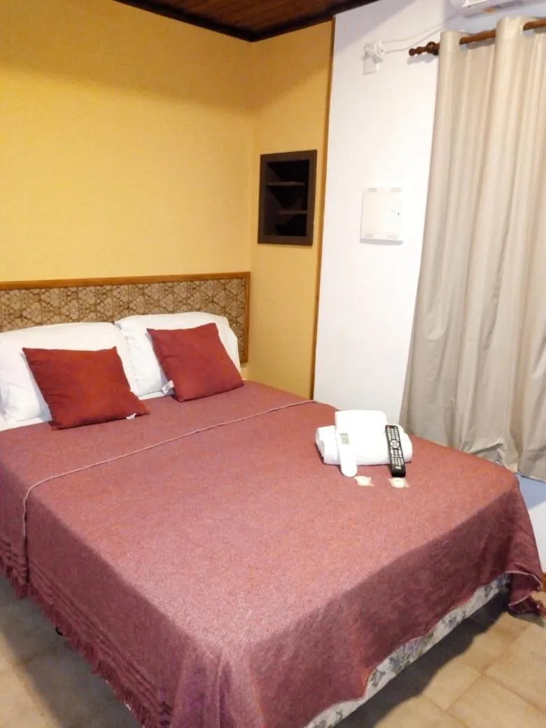 Bed in El Uru Suite Hotel