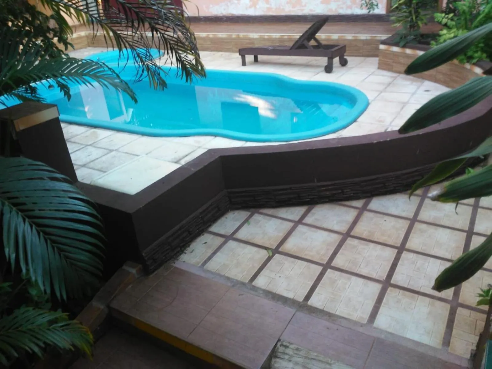 Swimming pool in El Uru Suite Hotel
