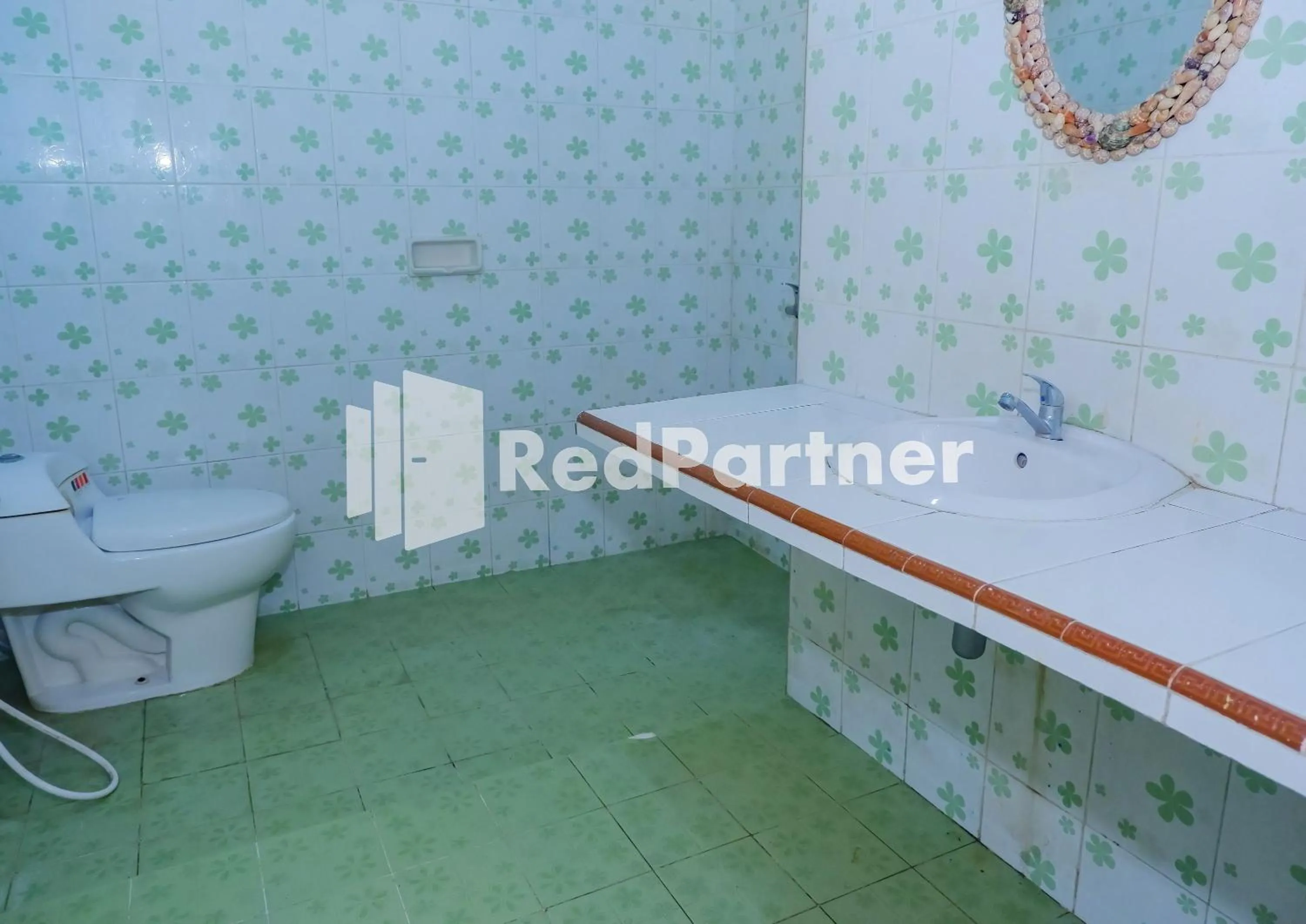 Bathroom in MS Hotel Pangandaran Mitra RedDoorz