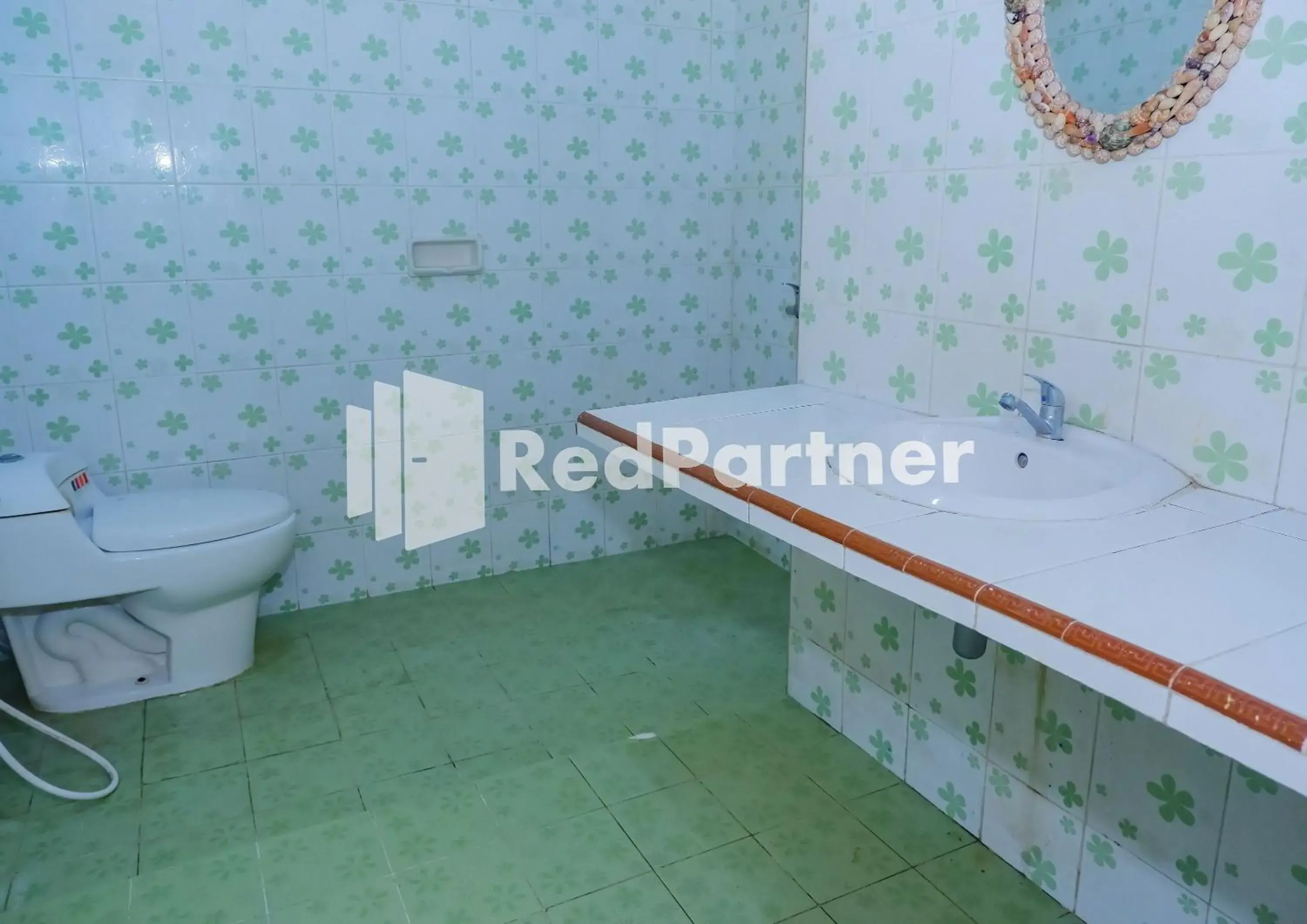 Bathroom in MS Hotel Pangandaran Mitra RedDoorz Bathroom in MS Hotel Pangandaran Mitra RedDoorz