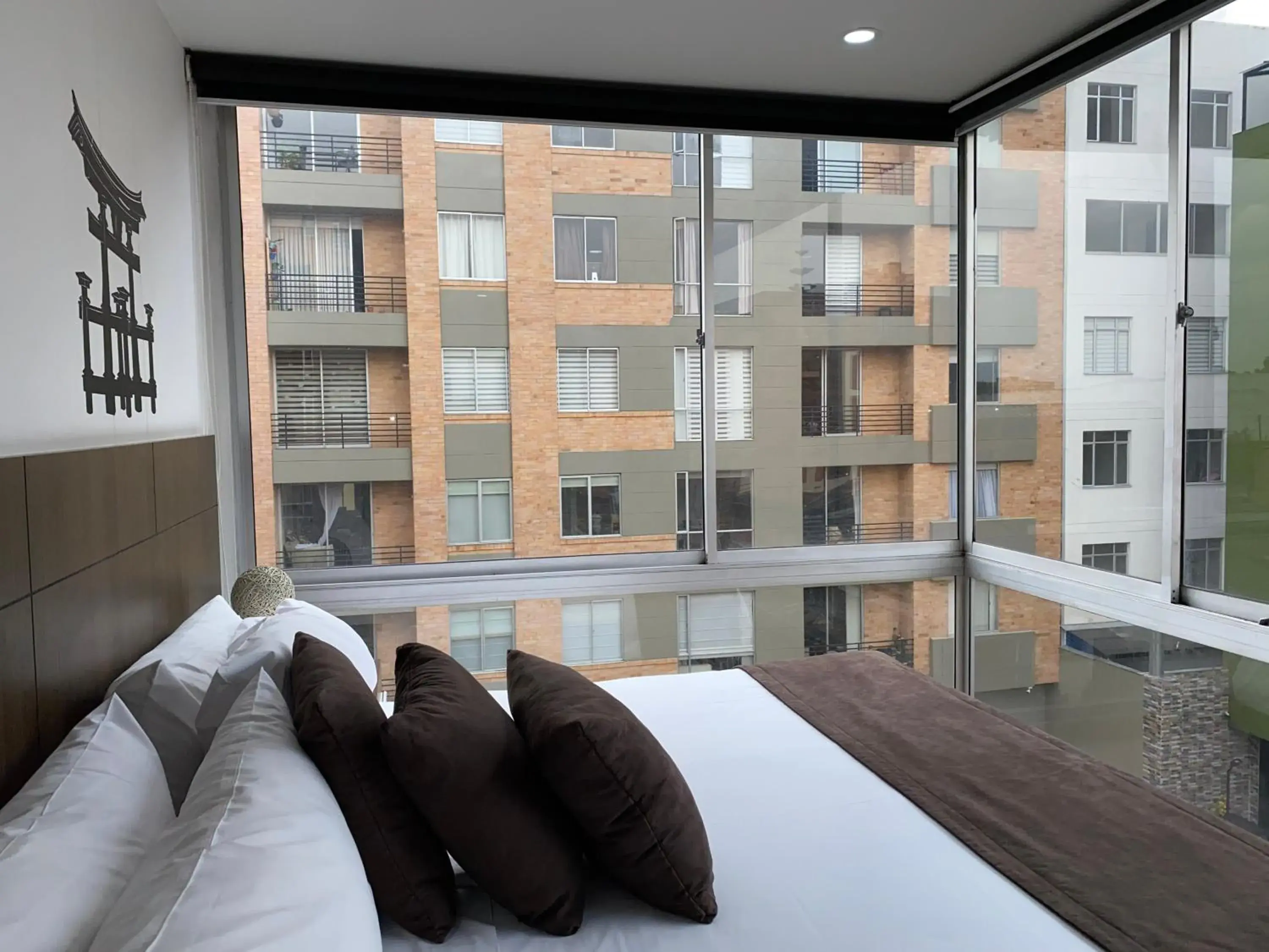 View (from property/room), Bed in Hotel Apartamentos Regency La Feria View (from property/room), Bed in Hotel Apartamentos Regency La Feria